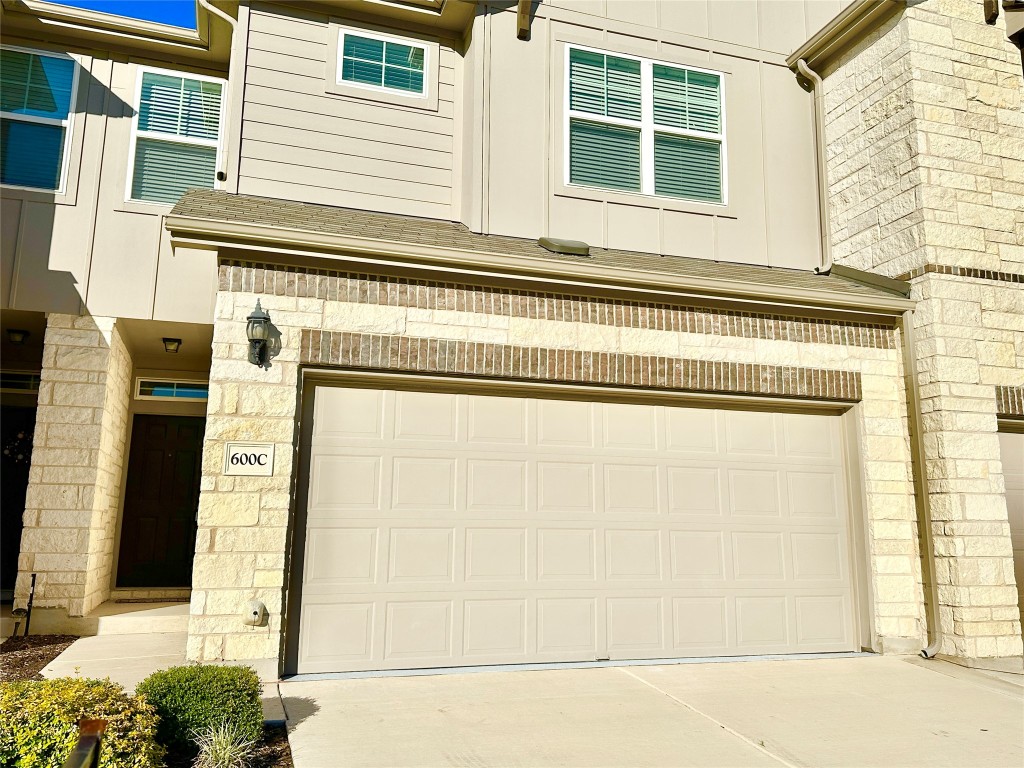 600 Pearly Eye Drive, Unit C Pflugerville, TX 78660 - Photo 1 of 37 a view of a house with a street