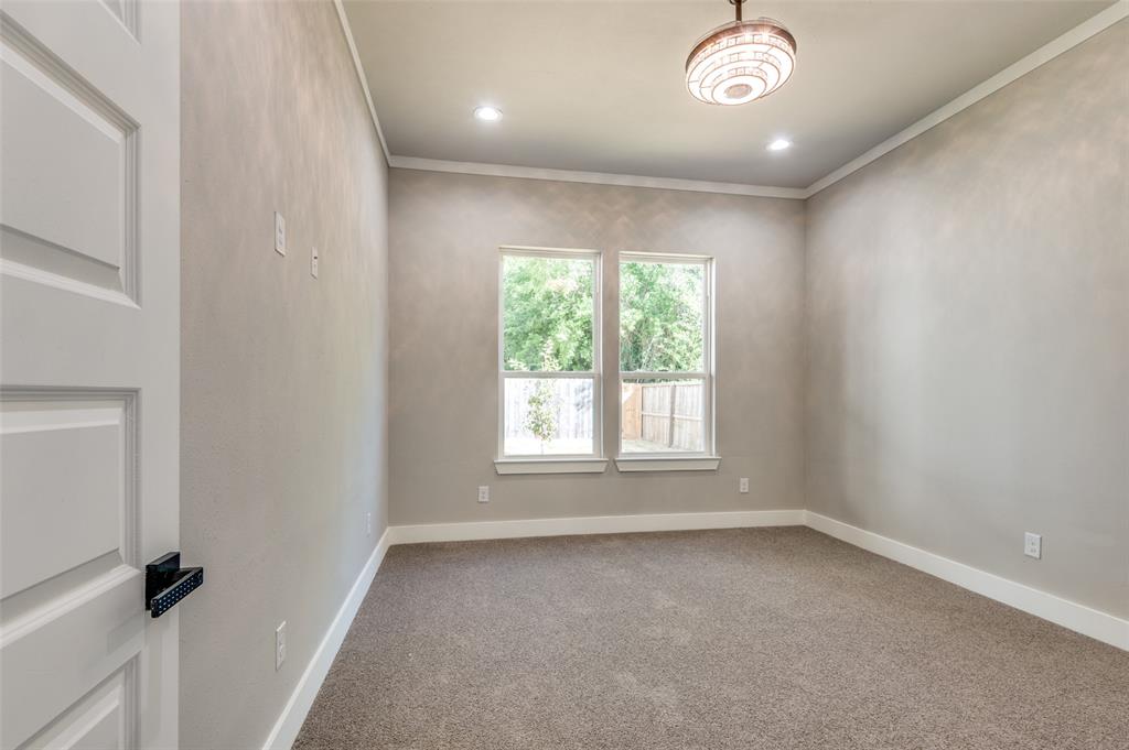4113 Metropolitan Avenue Dallas, TX 75210 - Photo 18 of 30 an empty room with a window