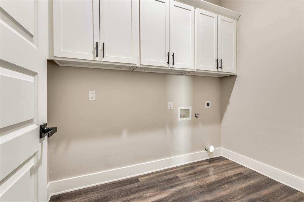 4113 Metropolitan Avenue Dallas, TX 75210 - Photo 23 of 30 a view of walk in closet with empty racks