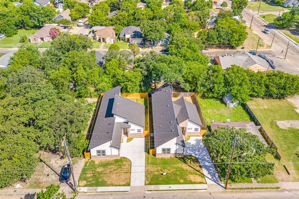 4113 Metropolitan Avenue Dallas, TX 75210 - Photo 27 of 30 an aerial view of a house with a yard and garden