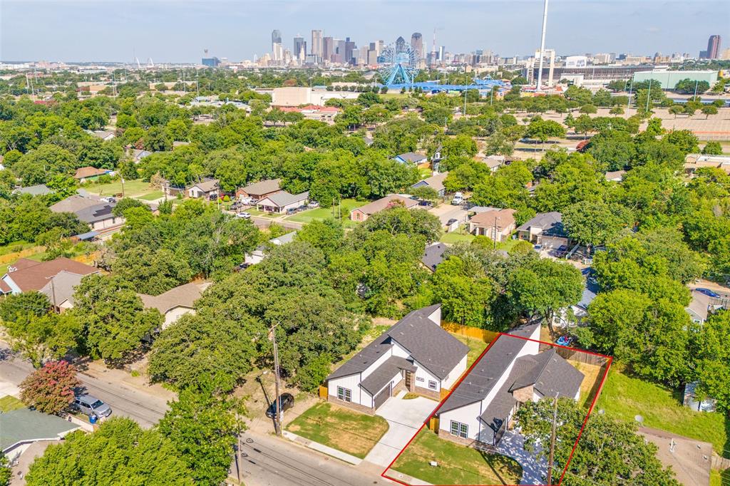 4113 Metropolitan Avenue Dallas, TX 75210 - Photo 28 of 30 an aerial view of residential houses with outdoor space and trees
