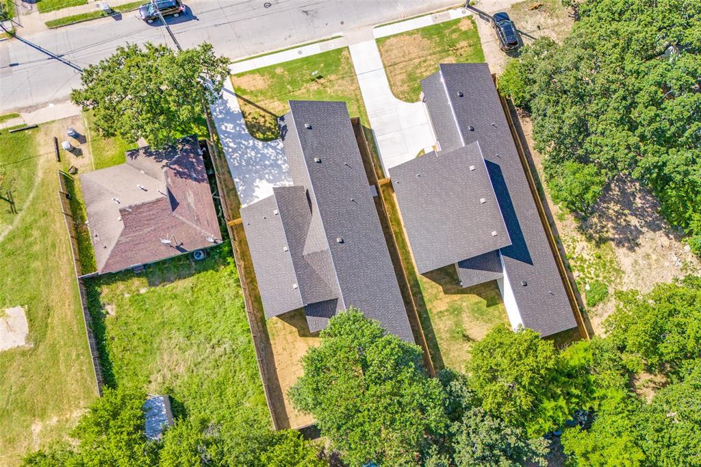 4113 Metropolitan Avenue Dallas, TX 75210 - Photo 29 of 30 an aerial view of house with yard and swimming pool
