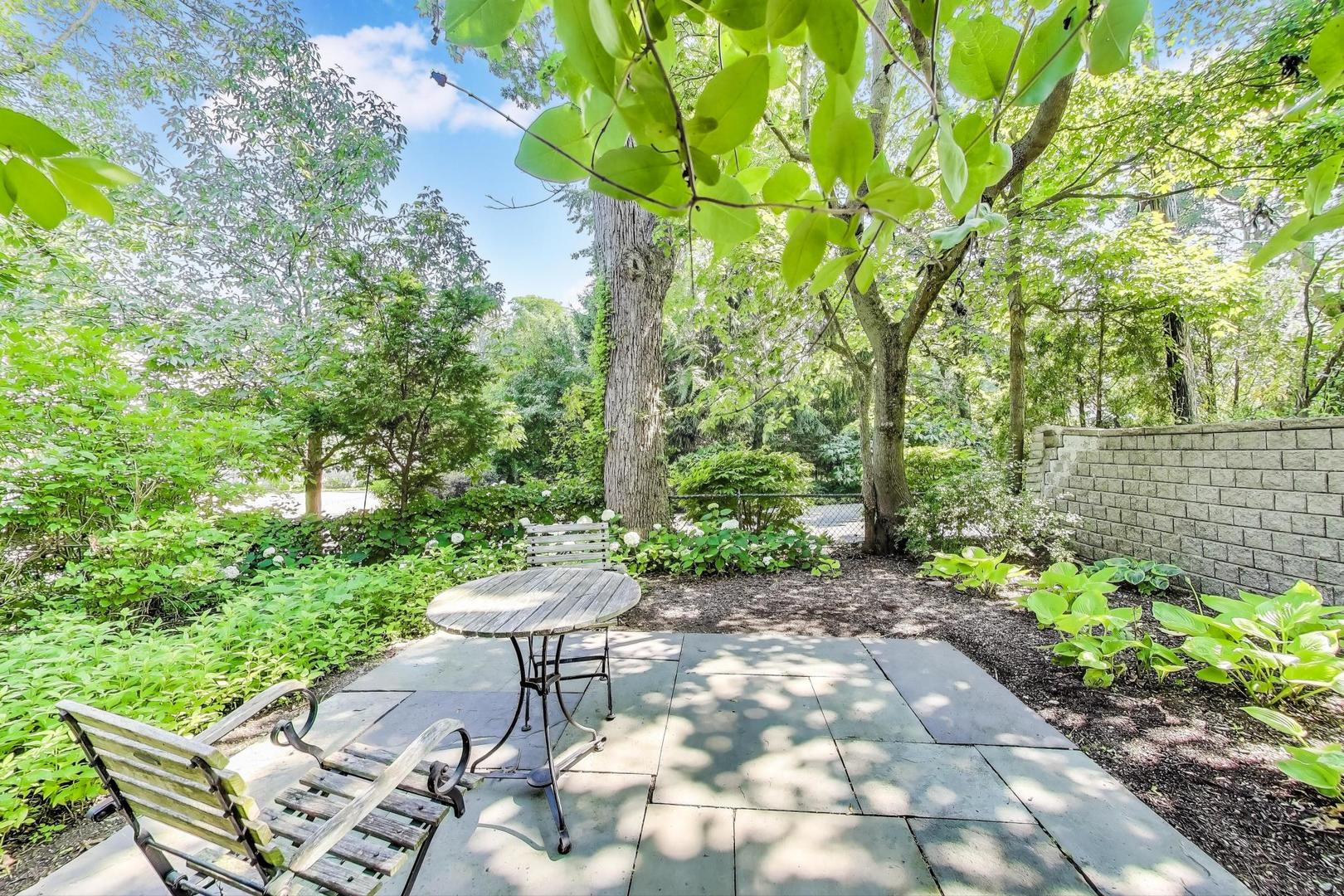 90 Riparian Road Highland Park, IL 60035 - Photo 54 of 76 a view of a backyard with sitting area