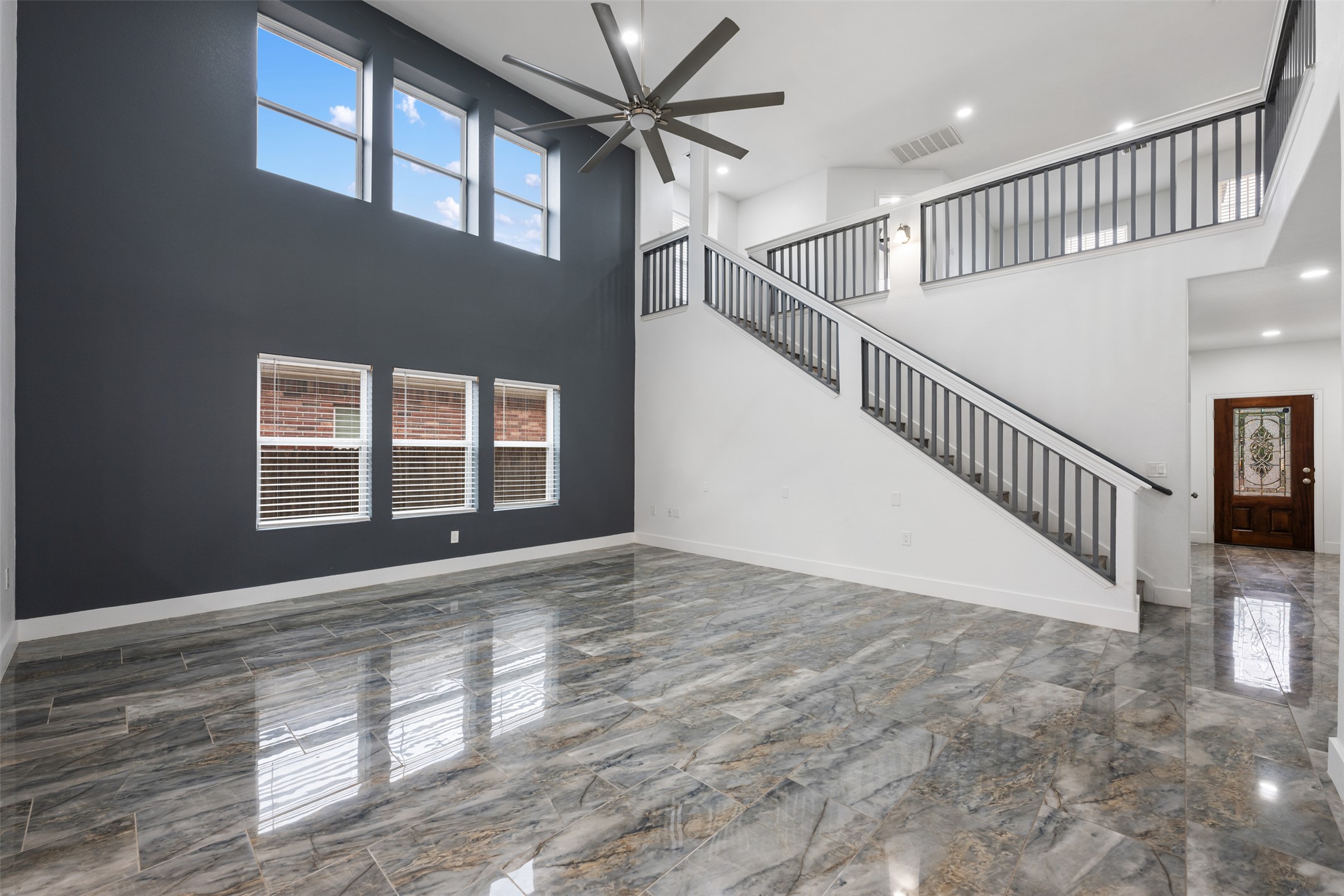3400 Stephans Street Pflugerville, TX 78660 - Photo 14 of 40 a view of an entryway with wooden floor