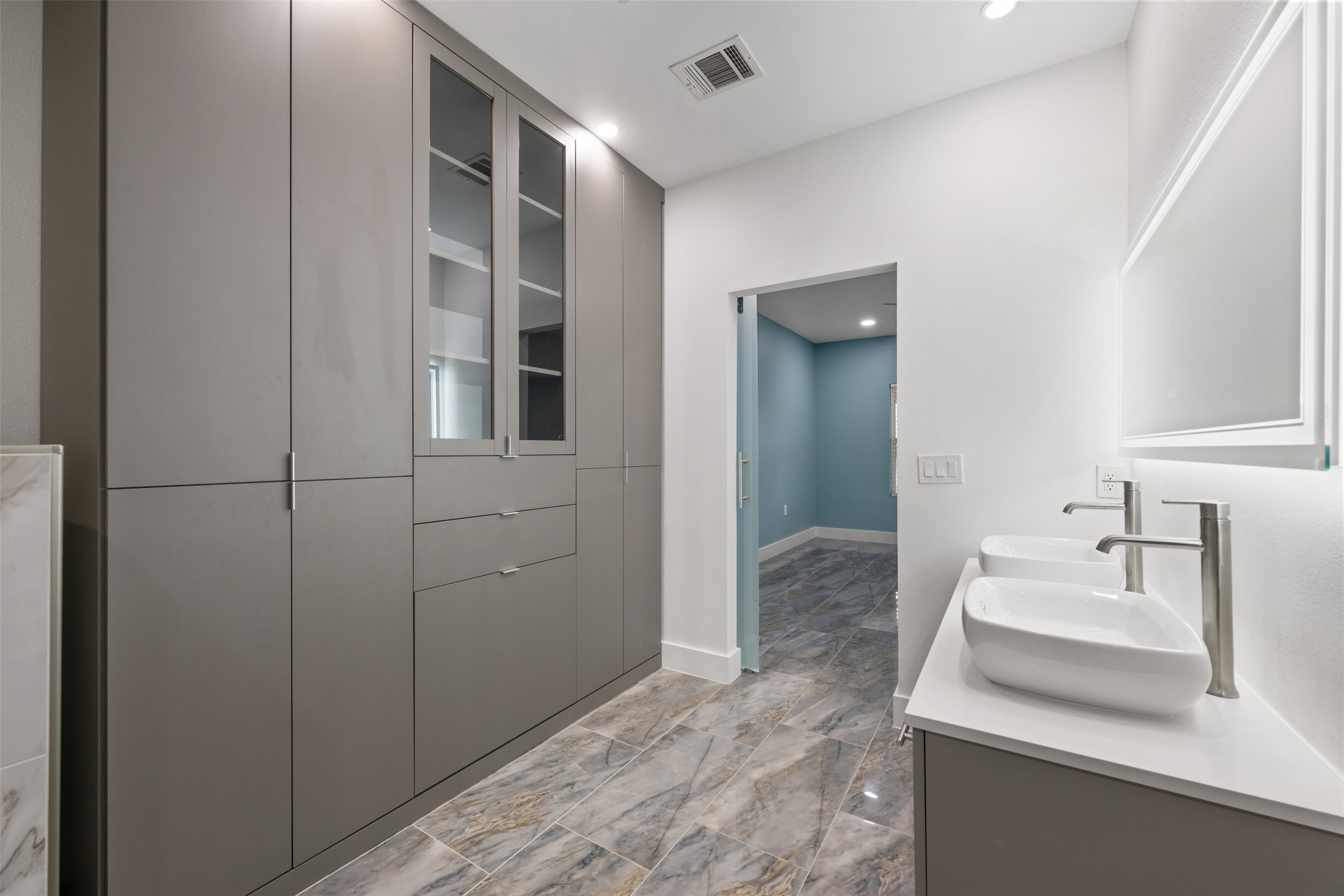 3400 Stephans Street Pflugerville, TX 78660 - Photo 25 of 40 a bathroom with a sink and mirror