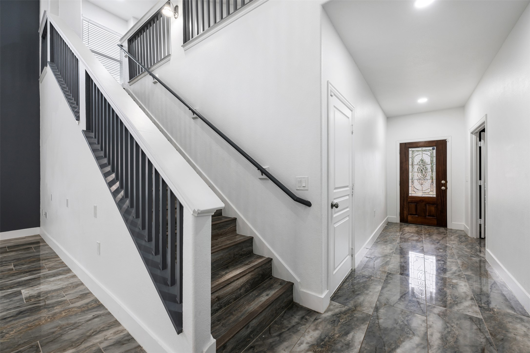 3400 Stephans Street Pflugerville, TX 78660 - Photo 28 of 40 a view of a hallway with wooden floor and entryway