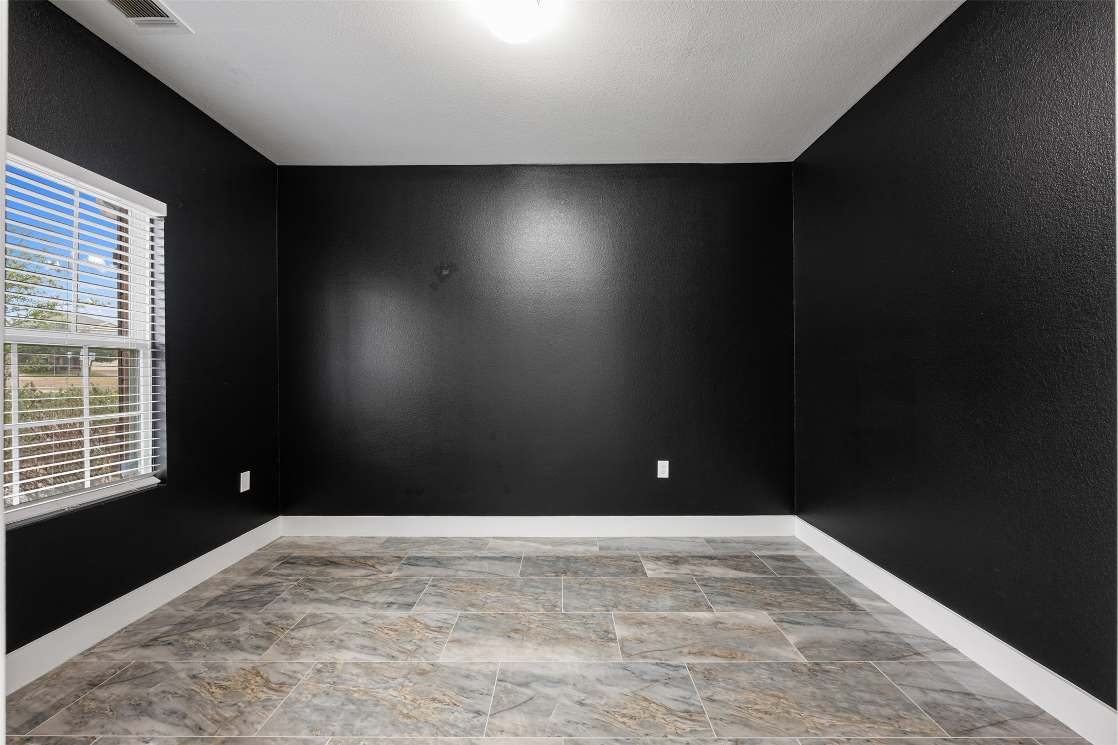 3400 Stephans Street Pflugerville, TX 78660 - Photo 7 of 40 a view of an empty room with a window