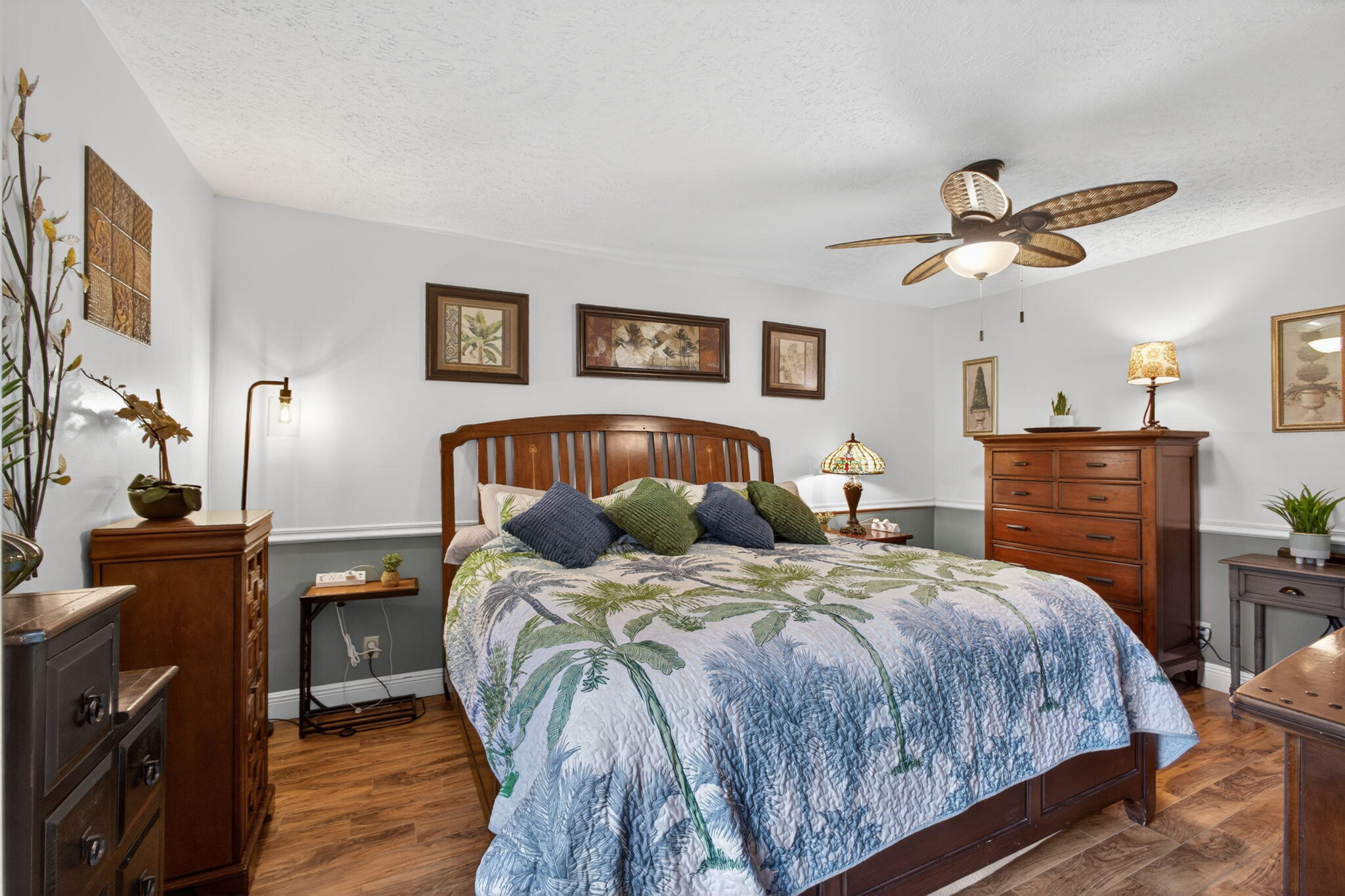 12558 165th Road North Jupiter, FL 33478 - Photo 26 of 67 a bedroom with a bed and wooden floor