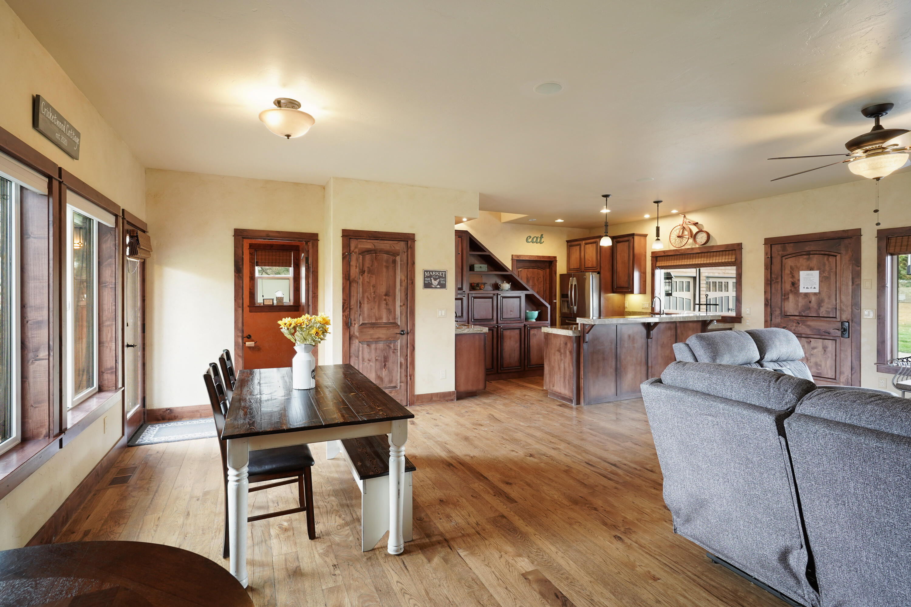 63520 Cricketwood Road Bend, OR 97701 - Photo 55 of 84 a living room with furniture and wooden floor