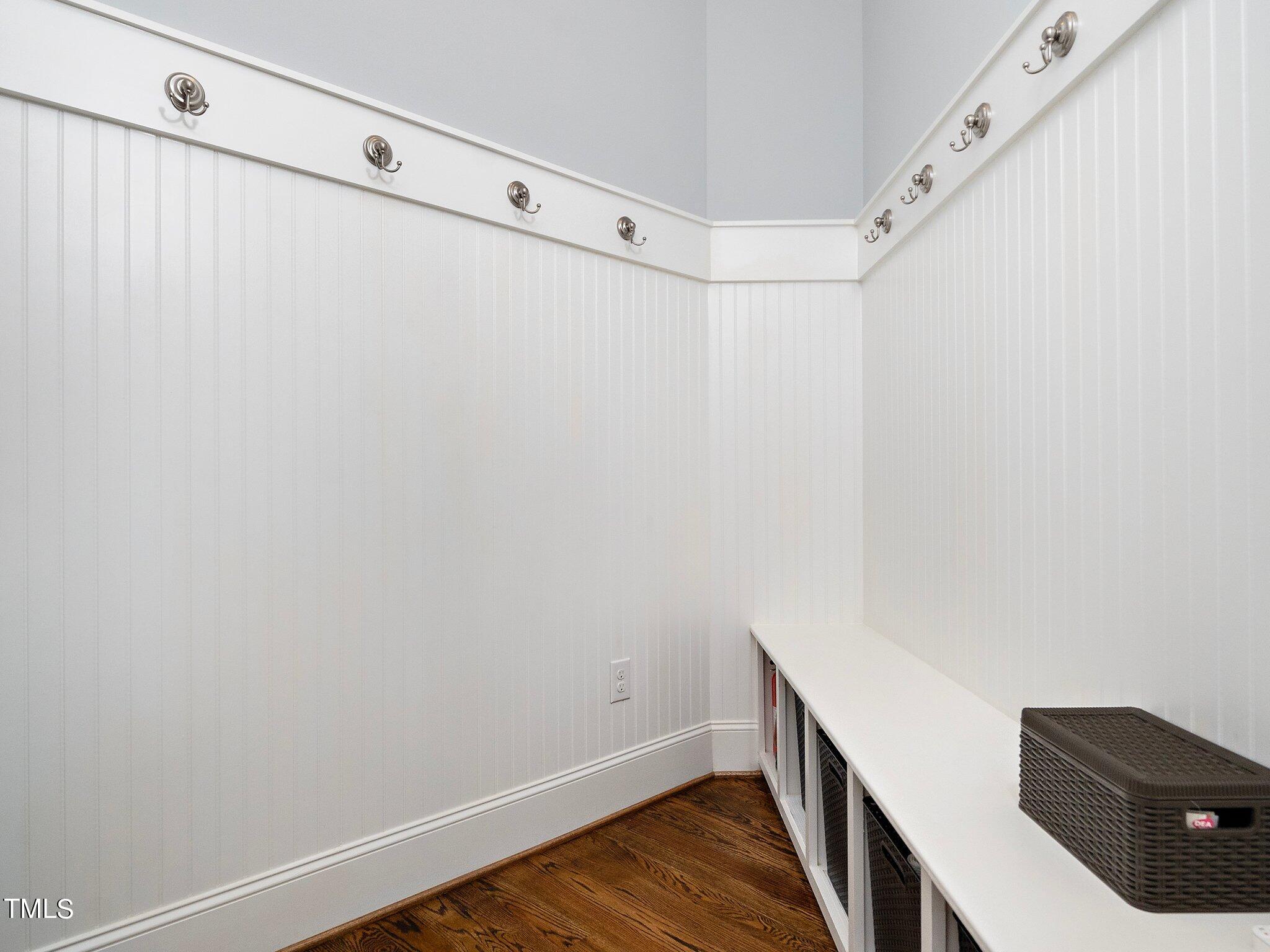7733 Wilderness Road Raleigh, NC 27613 - Photo 18 of 37 a view of room with wooden floor