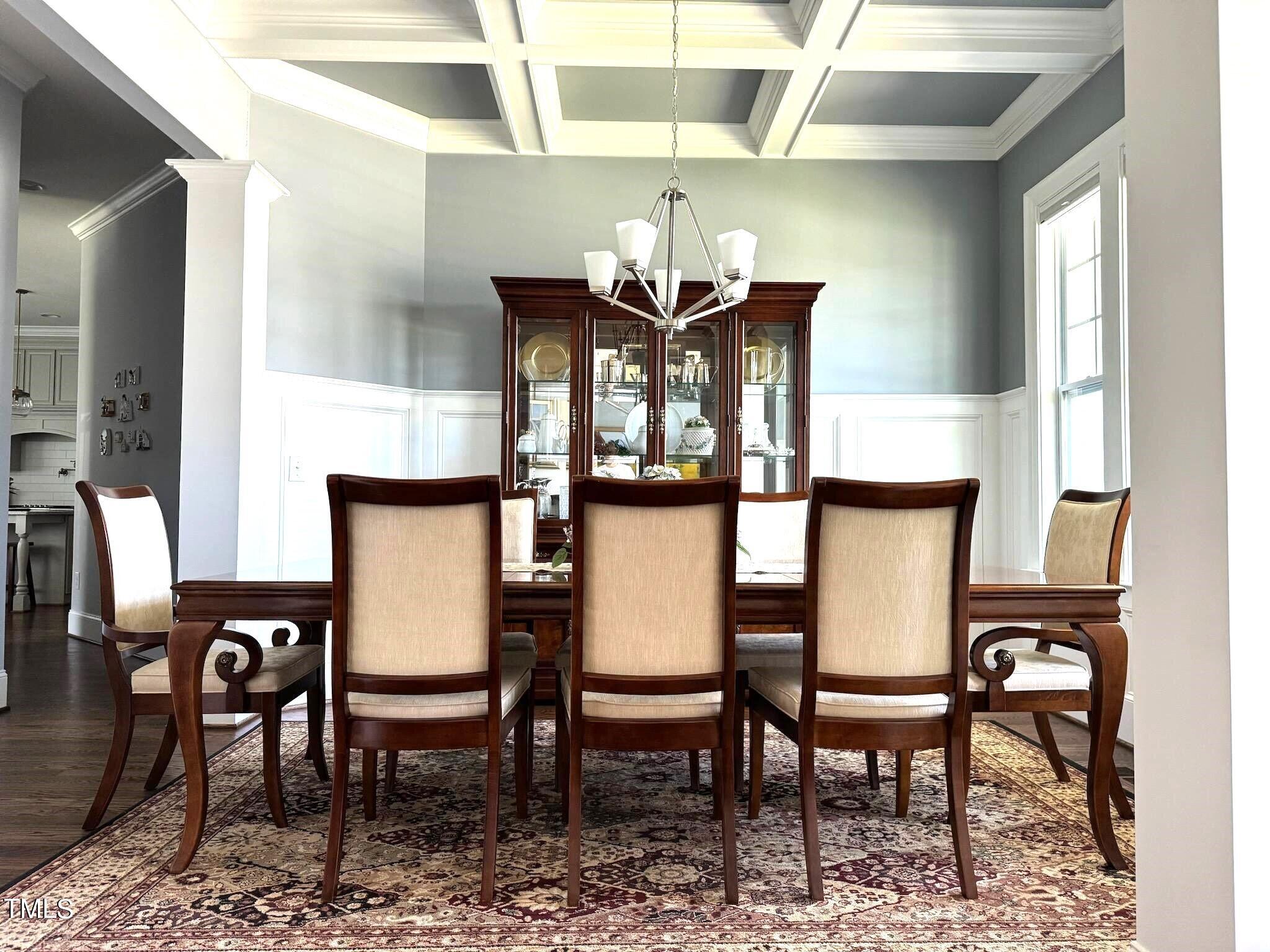 7733 Wilderness Road Raleigh, NC 27613 - Photo 7 of 37 a view of a dining room with furniture