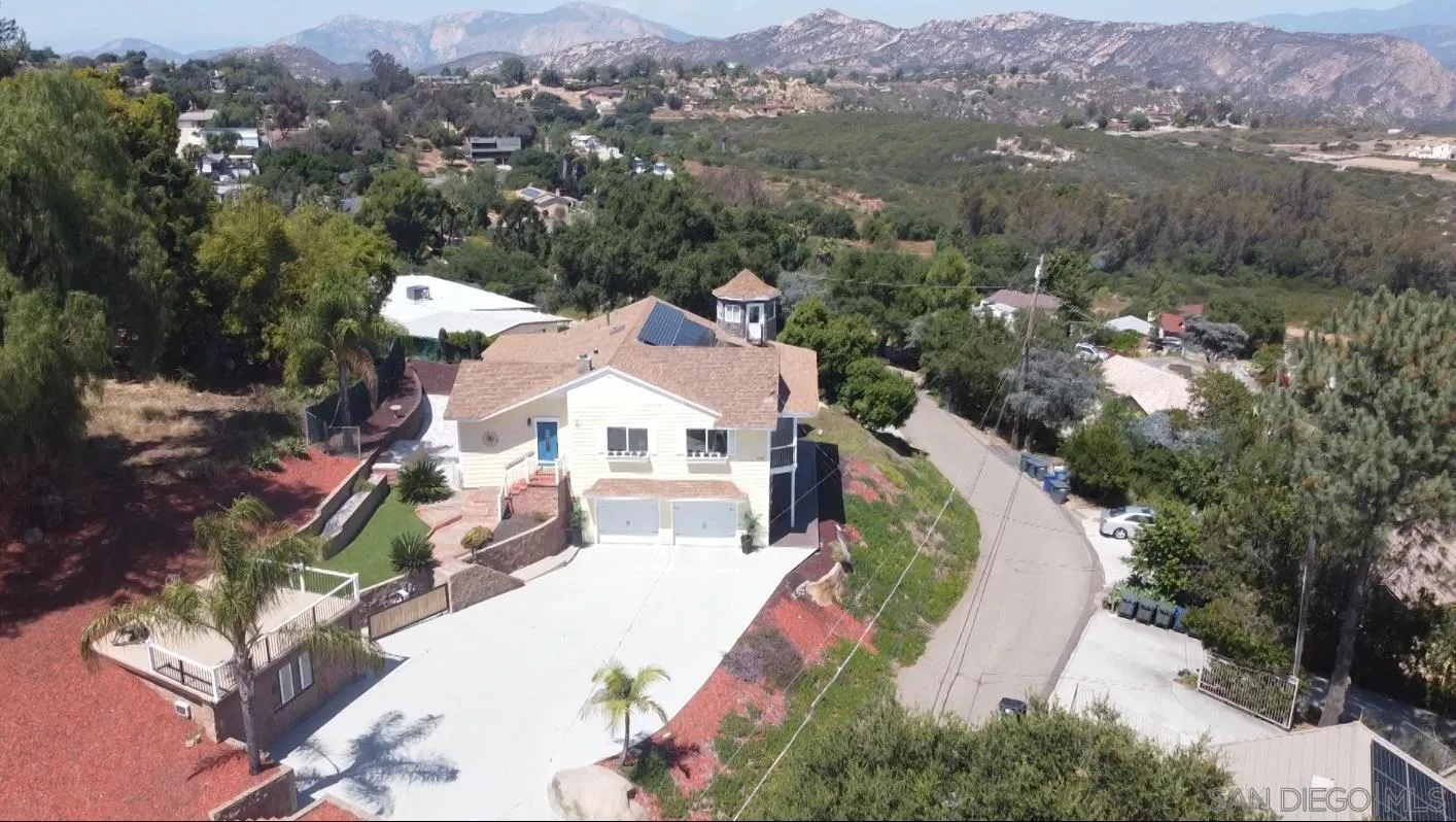 205 Highline Trail El Cajon, CA 92021 - Photo 4 of 45 an aerial view of a house with a mountain