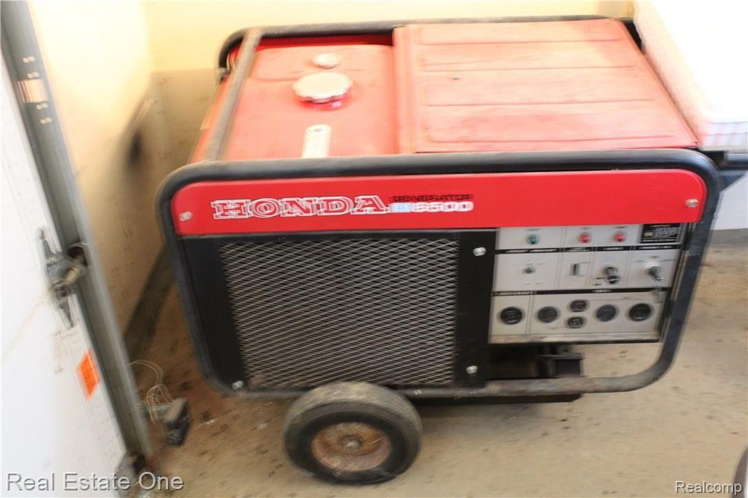 6474 Byron Road Howell, MI 48855 - Photo 62 of 62 GENERATOR PLUGS INTO WALL BOX
