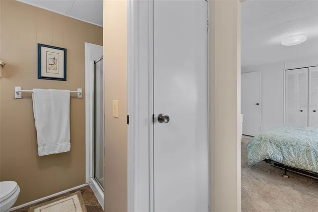 a view of room and bathroom