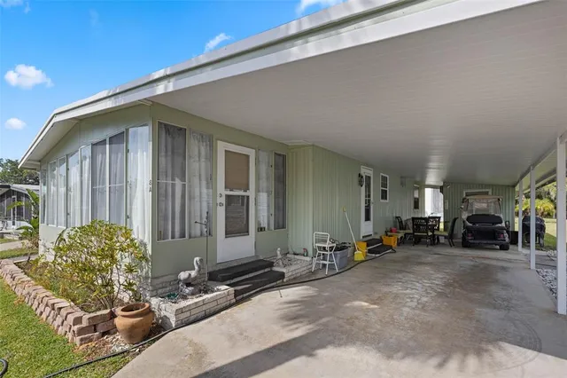 a view of a chairs in front of house