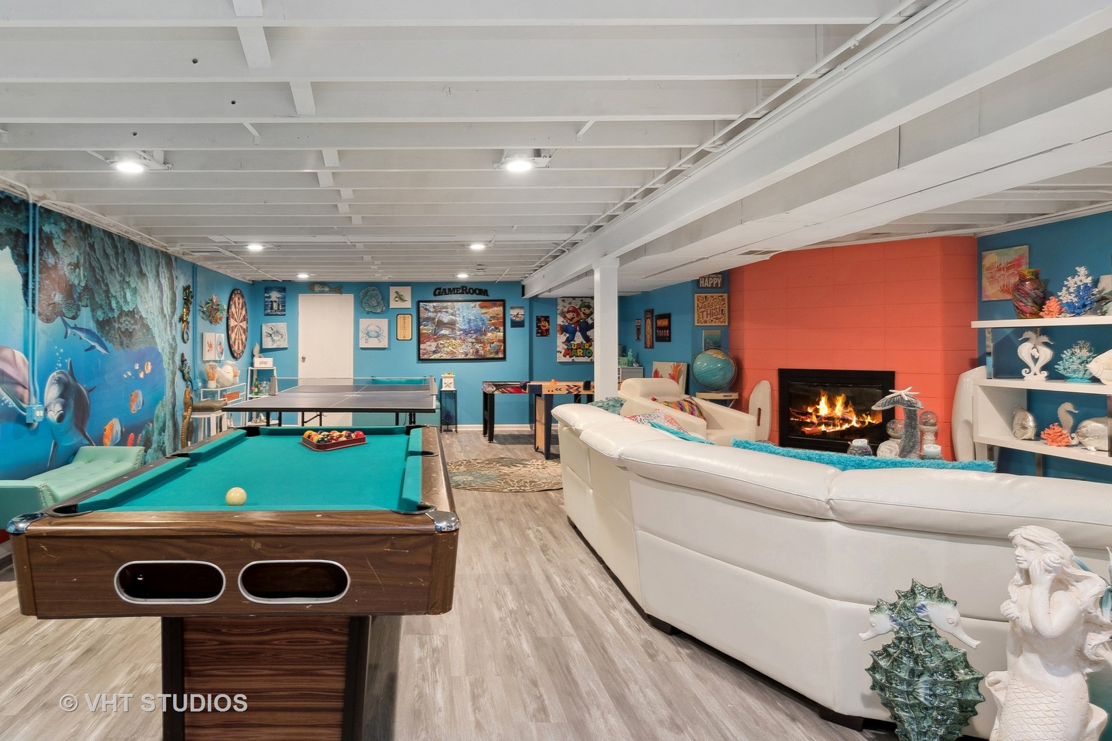 14107 Naperville Road Plainfield, IL 60544 - Photo 30 of 49 a living room with furniture and a flat screen tv