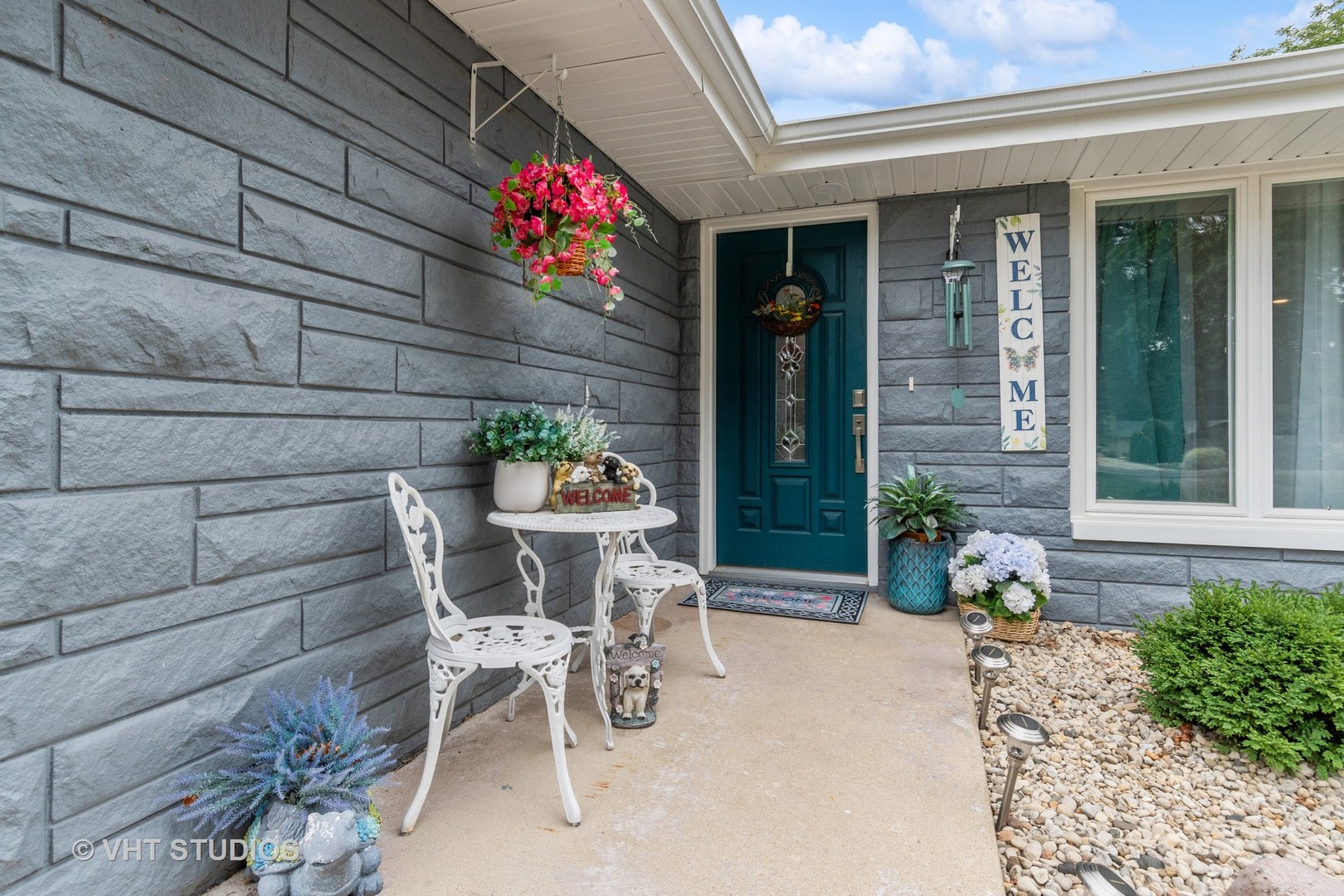 14107 Naperville Road Plainfield, IL 60544 - Photo 3 of 49 a view of a chair and table in back yard of the house