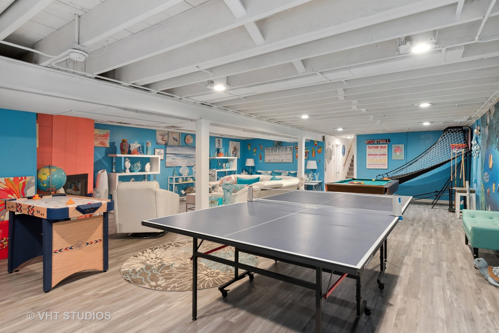 14107 Naperville Road Plainfield, IL 60544 - Photo 31 of 49 a view of a dining room with furniture wooden floor and a rug