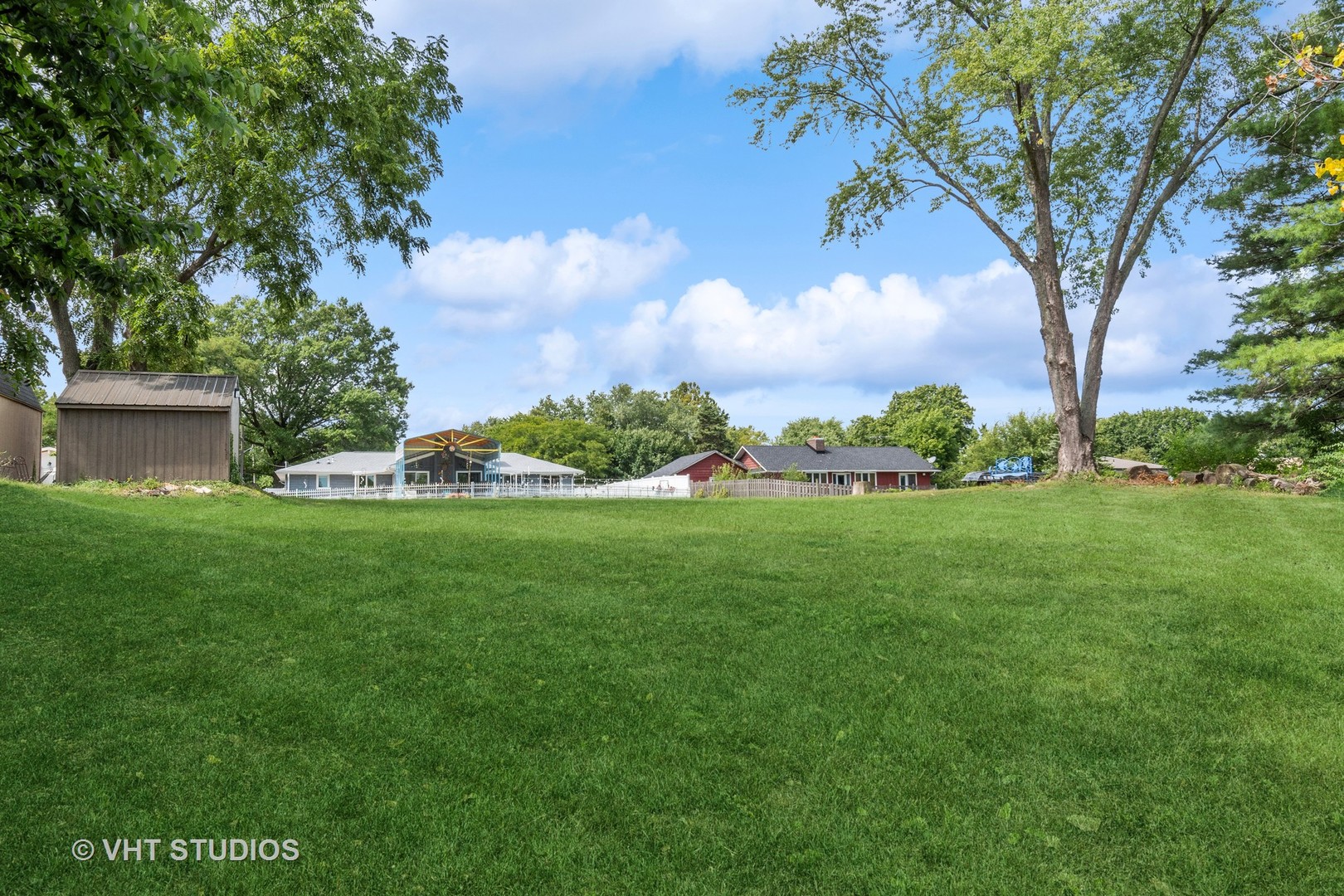 14107 Naperville Road Plainfield, IL 60544 - Photo 36 of 49 a view of yard with swimming pool and green space