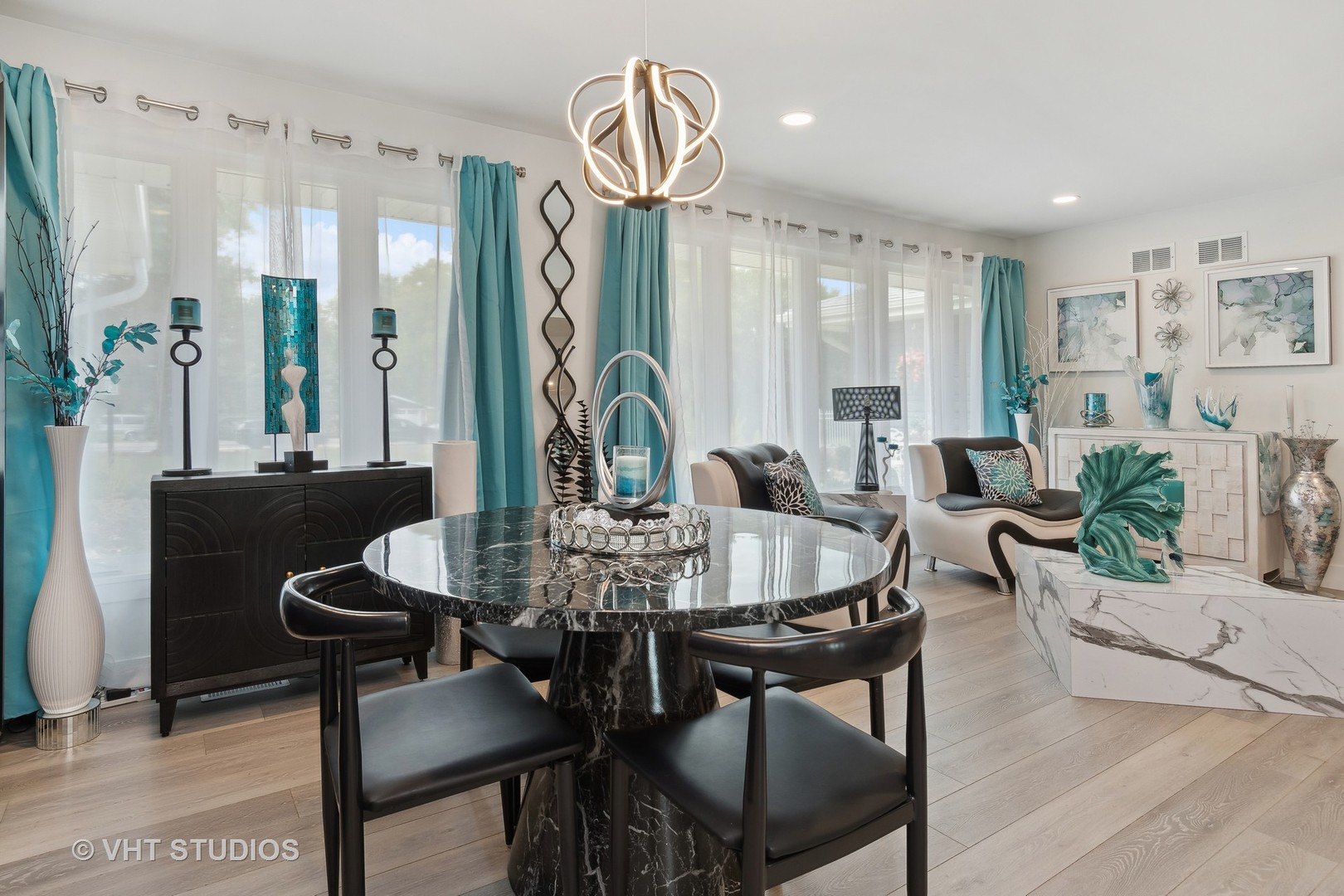 14107 Naperville Road Plainfield, IL 60544 - Photo 7 of 49 a view of a a dining room with furniture window and wooden floor