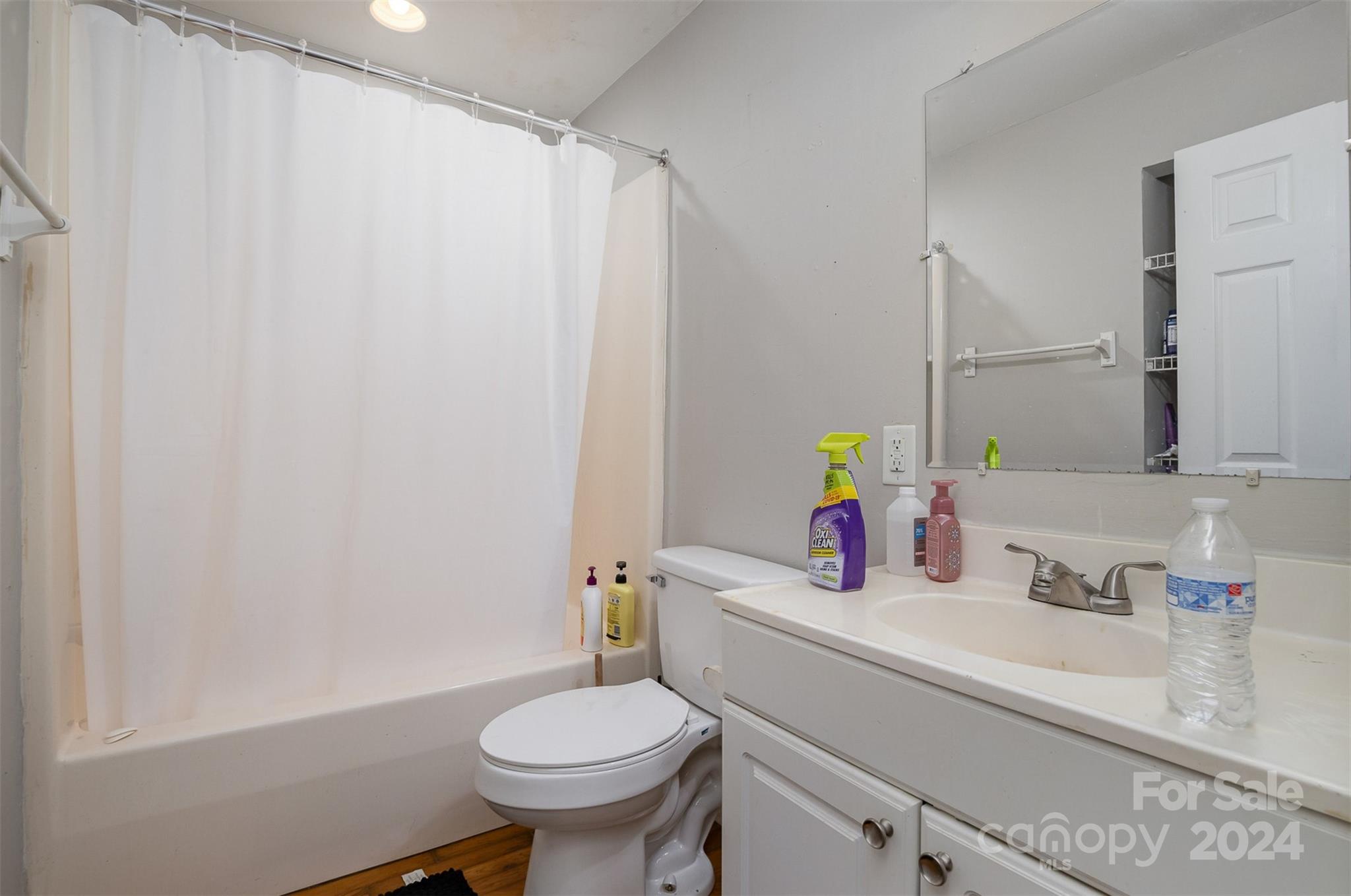 484 Cook Street Northwest Concord, NC 28025 - Photo 29 of 32 a bathroom with a sink and a toilet