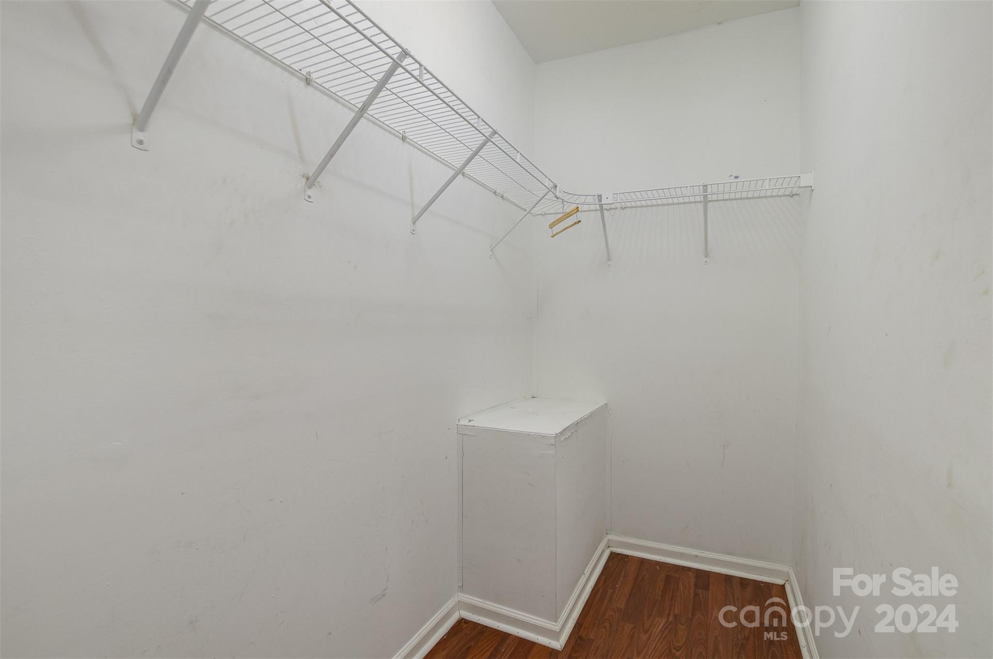 484 Cook Street Northwest Concord, NC 28025 - Photo 10 of 32 a view of small space with empty racks on the wall