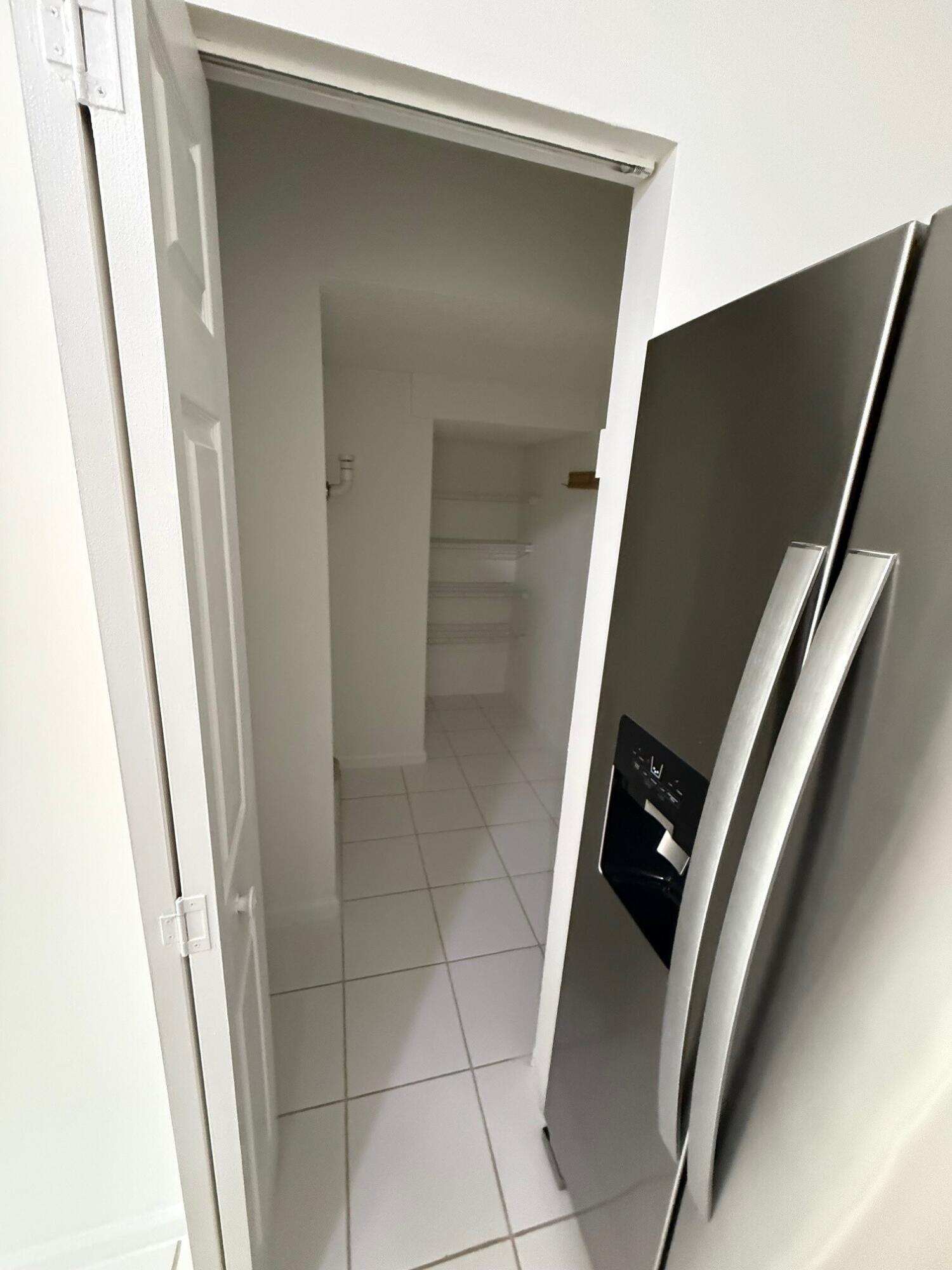 20931 Vía Jasmine, Unit 6 Boca Raton, FL 33428 - Photo 12 of 34 Kitchen Pantry