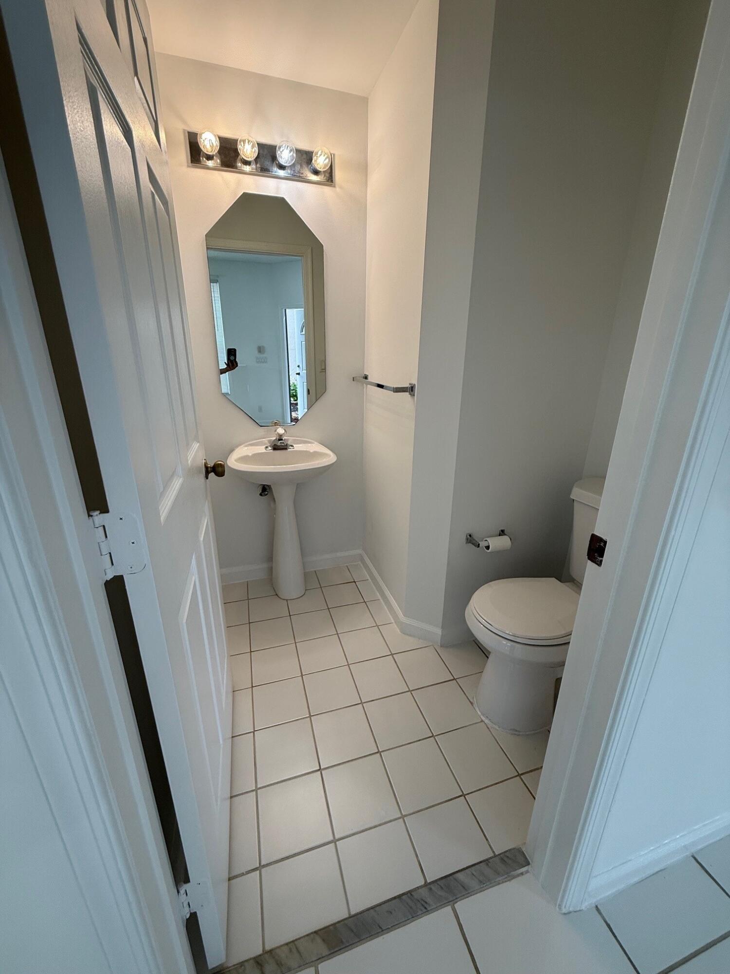 20931 Vía Jasmine, Unit 6 Boca Raton, FL 33428 - Photo 13 of 34 Downstairs Half Bath