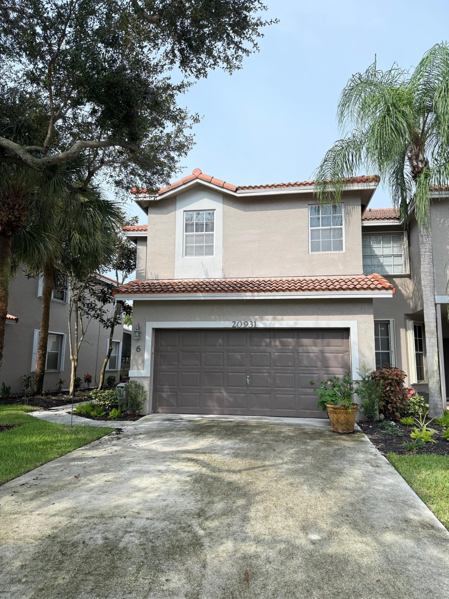 20931 Vía Jasmine, Unit 6 Boca Raton, FL 33428 - Photo 2 of 34 House Front