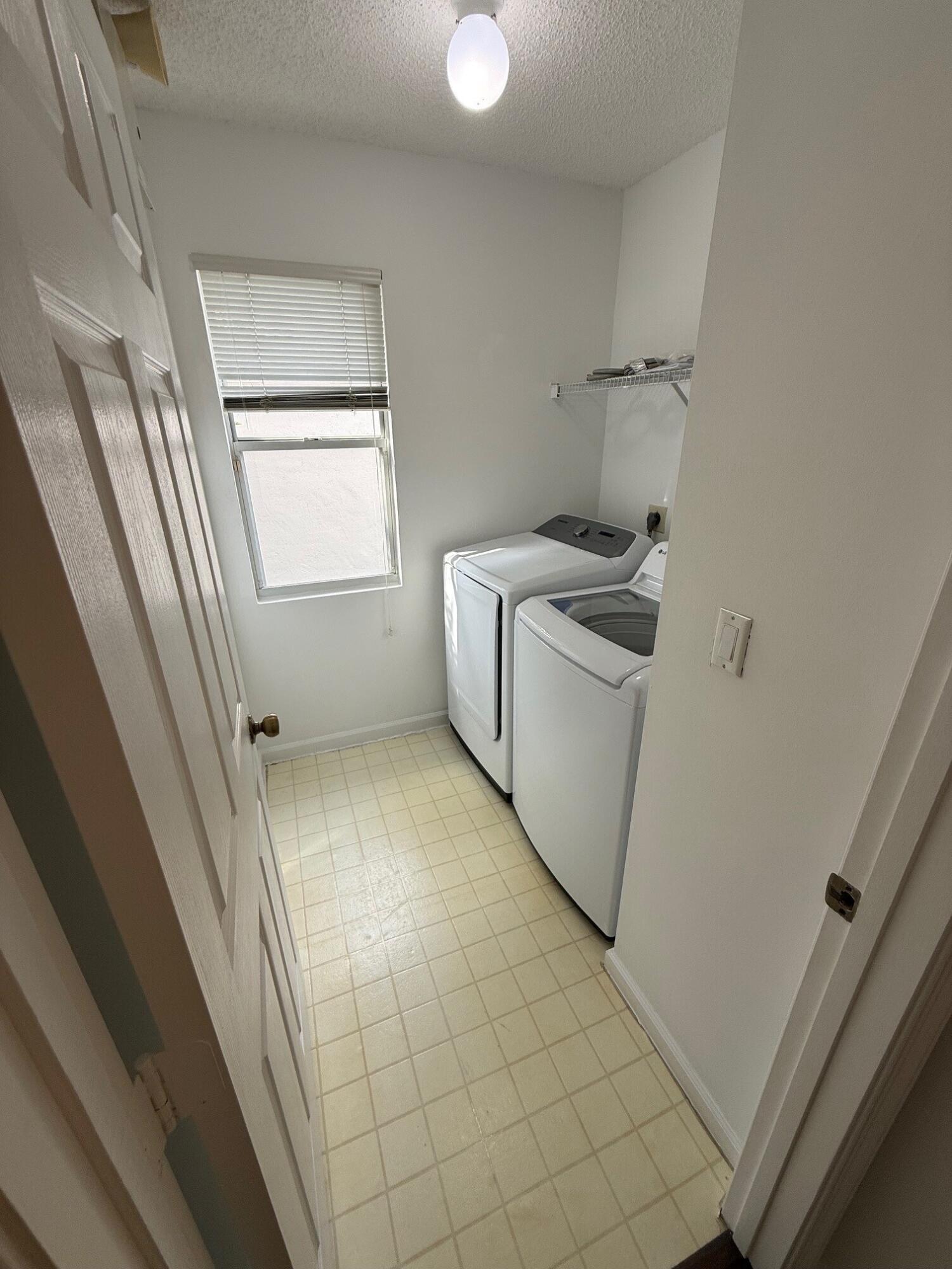 20931 Vía Jasmine, Unit 6 Boca Raton, FL 33428 - Photo 29 of 34 Laundry Room Upstairs