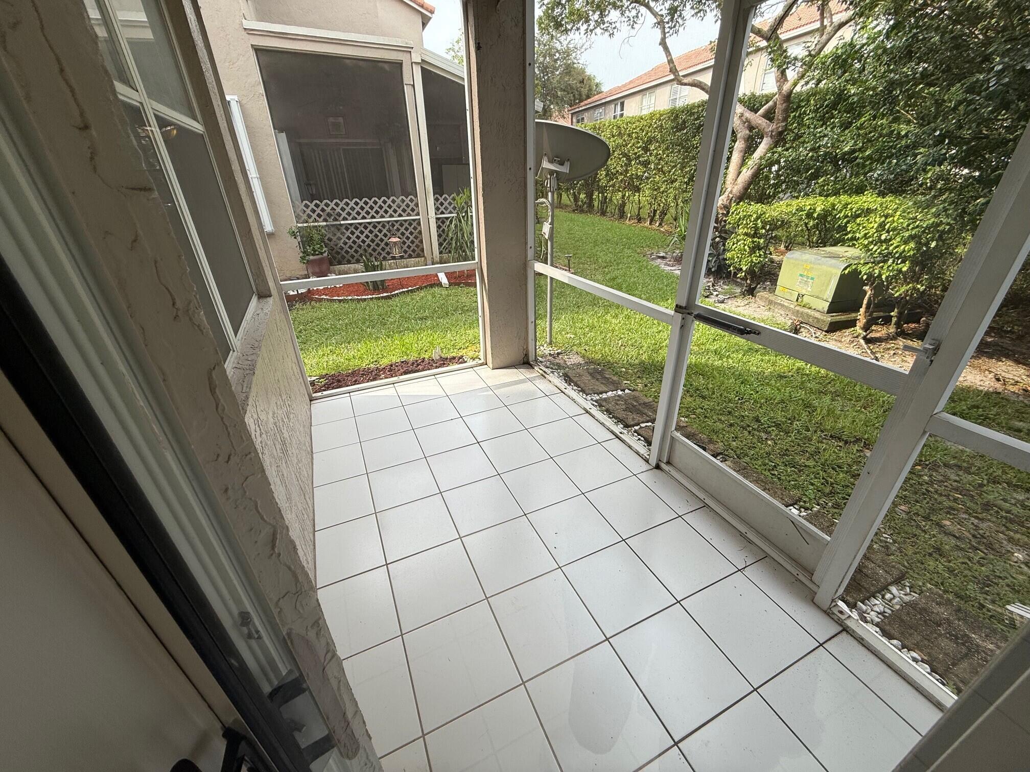 20931 Vía Jasmine, Unit 6 Boca Raton, FL 33428 - Photo 31 of 34 Screened Patio 2