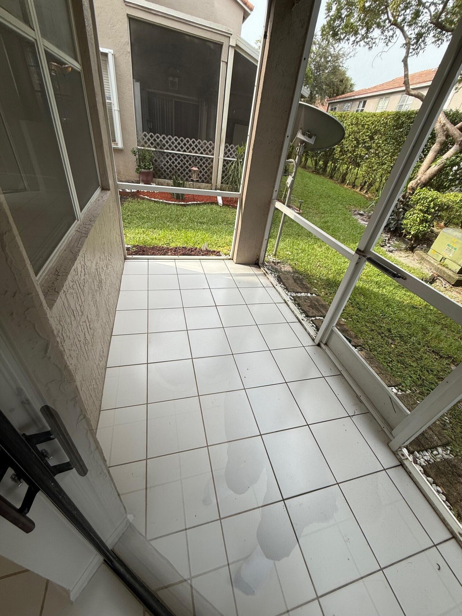 20931 Vía Jasmine, Unit 6 Boca Raton, FL 33428 - Photo 32 of 34 Screened Patio
