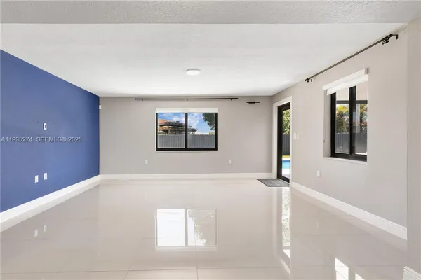 a view of an empty room with window