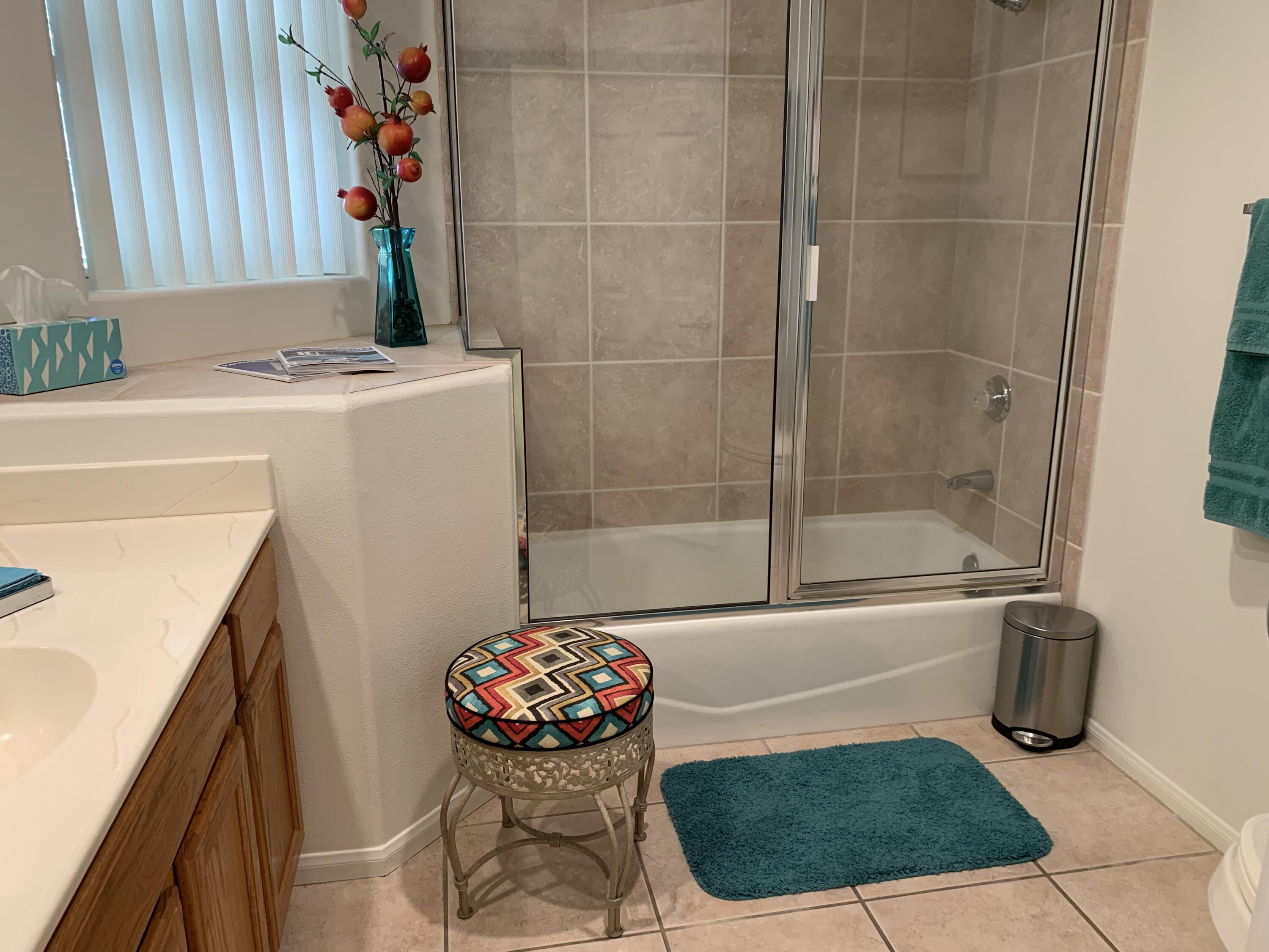 68921 Risueno Road Cathedral City, CA 92234 - Photo 10 of 20 a bathroom with a bath tub and a sink