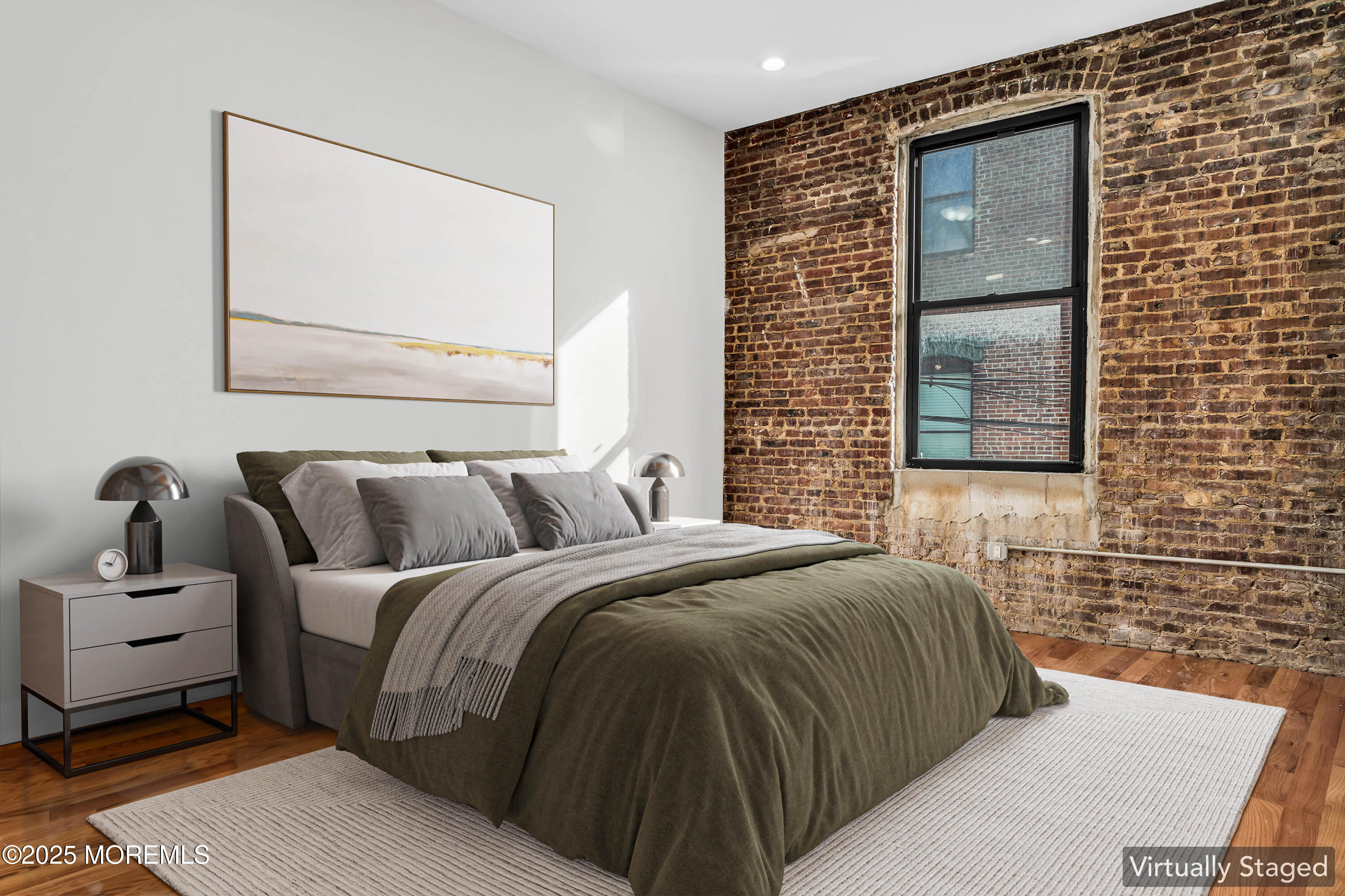 7 Broad Street, Unit 1 Red Bank, NJ 07701 - Photo 15 of 28 a bedroom with a bed and a window