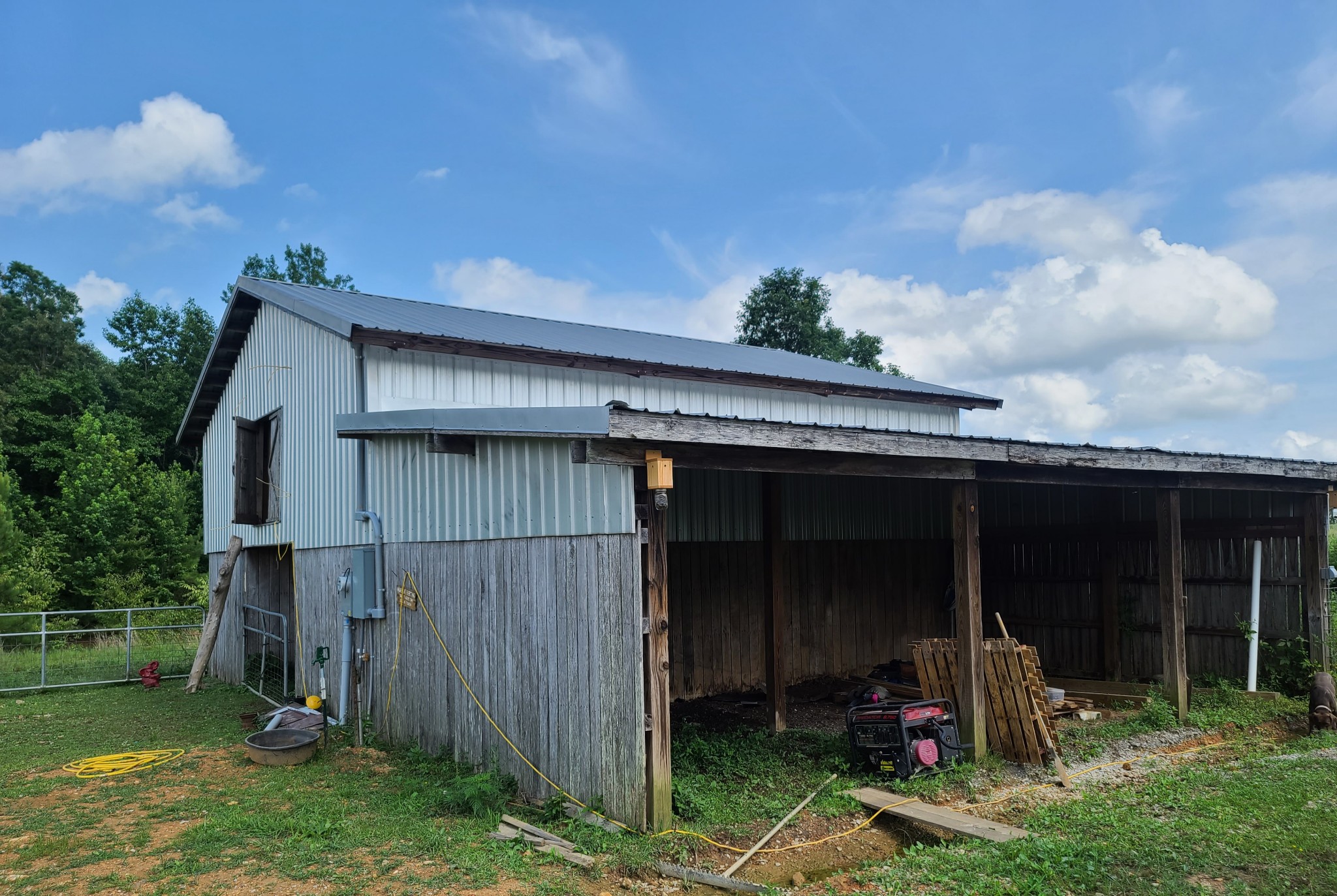 217 Lantz Road Lawrenceburg, TN 38464 - Photo 5 of 25 a backyard of a house with seating space