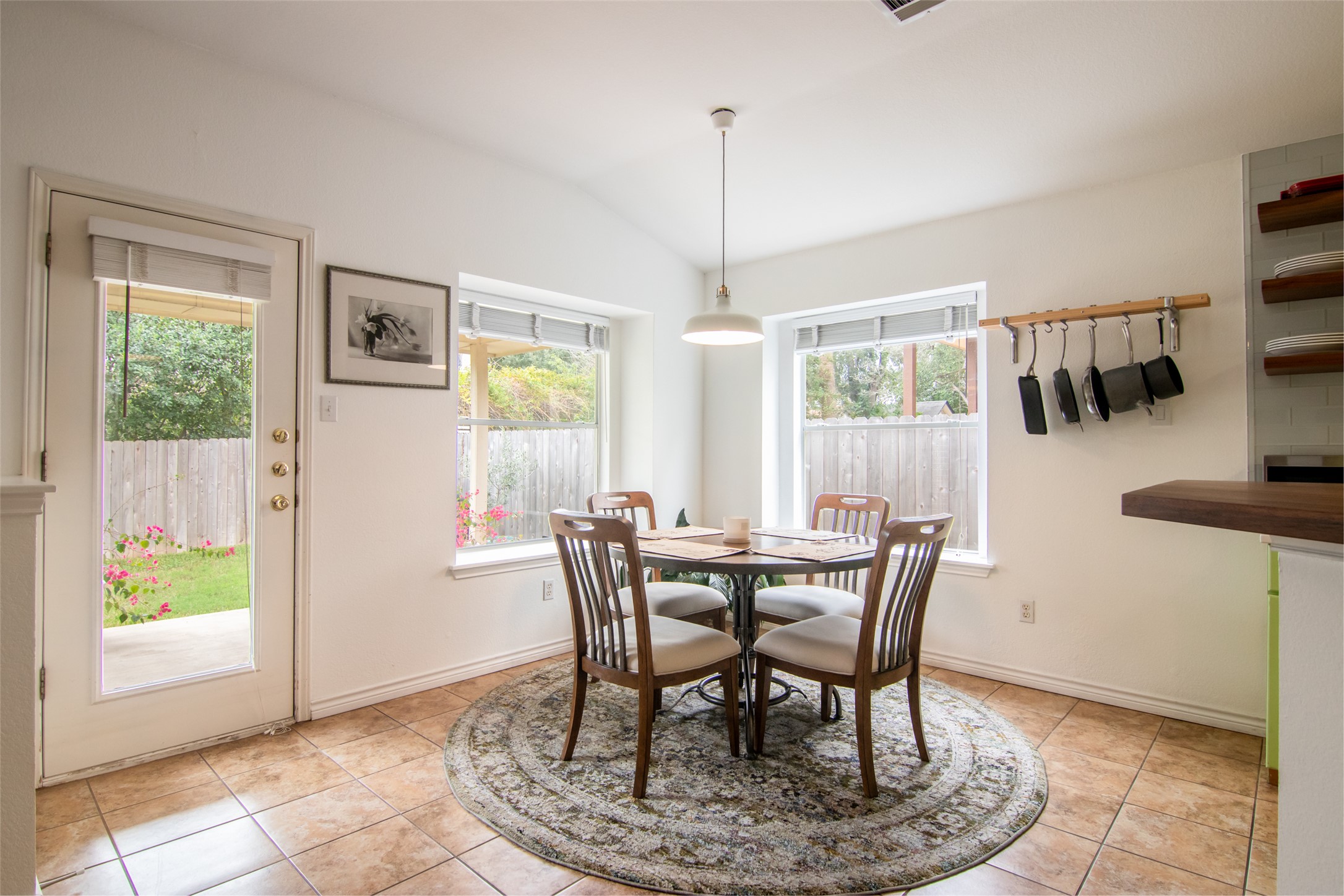8901 Copano Drive Austin, TX 78749 - Photo 10 of 29 Bright breakfast nook tucked into the back corner just off the kitchen, offering a comfortable and inviting dining space.