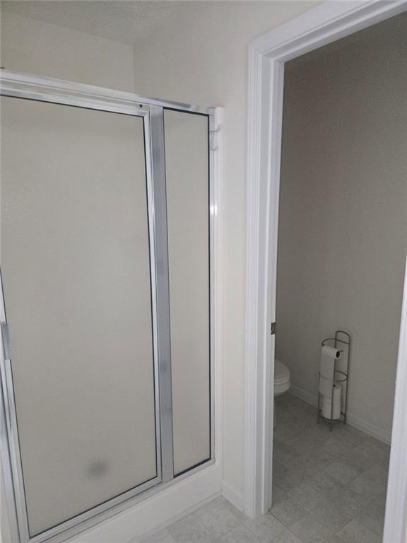22 Windcrest Keep Covington, GA 30016 - Photo 21 of 32 a bathroom with a shower