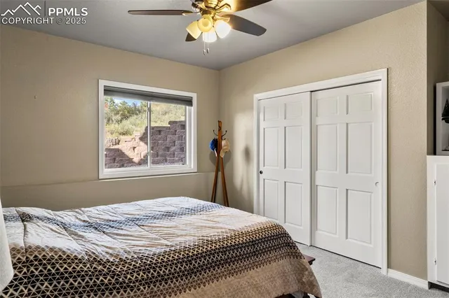a view of a backyard with furniture and a slide