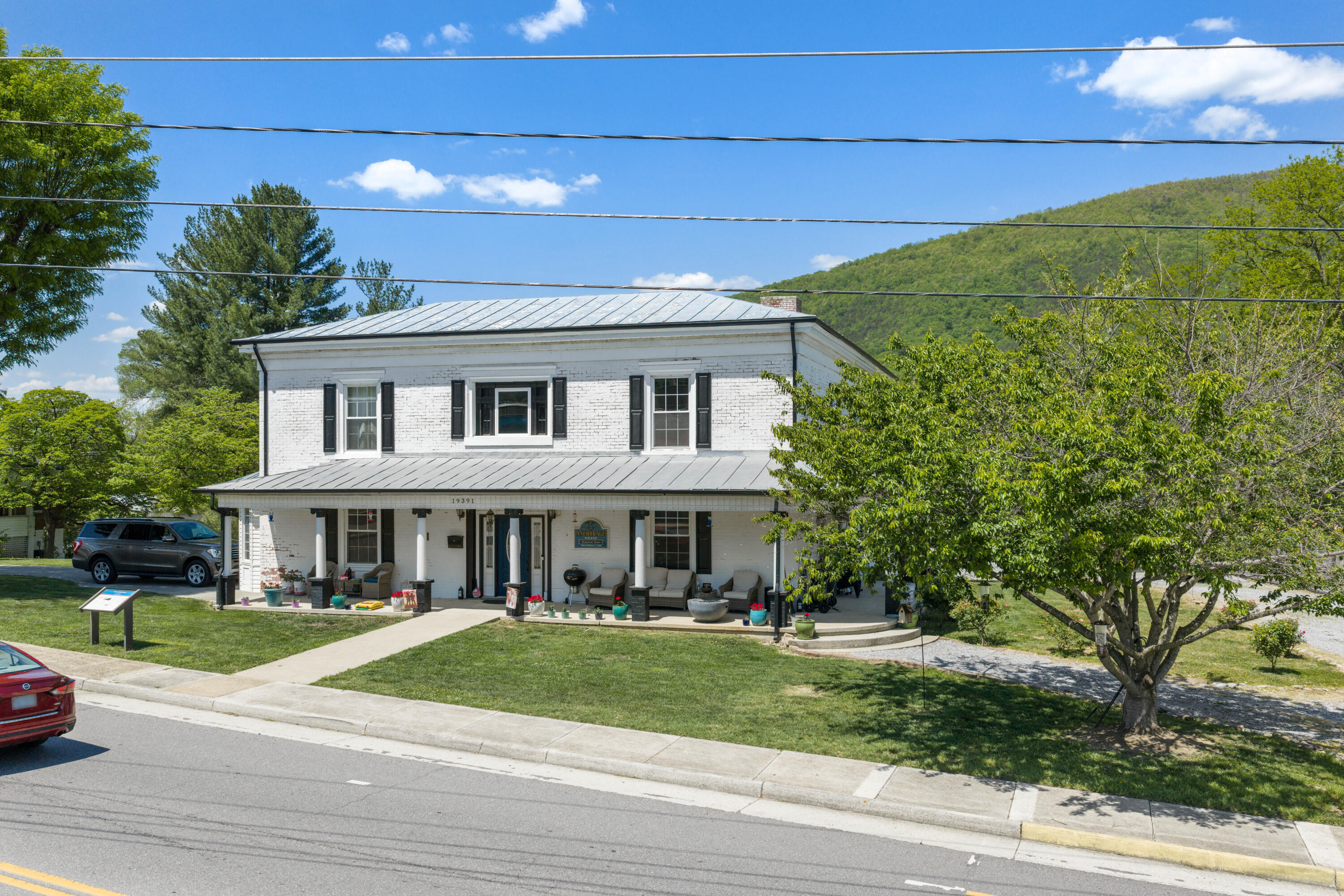 19391 Main Street Buchanan, VA 24066 - Photo 1 of 34 a view of a house with a yard
