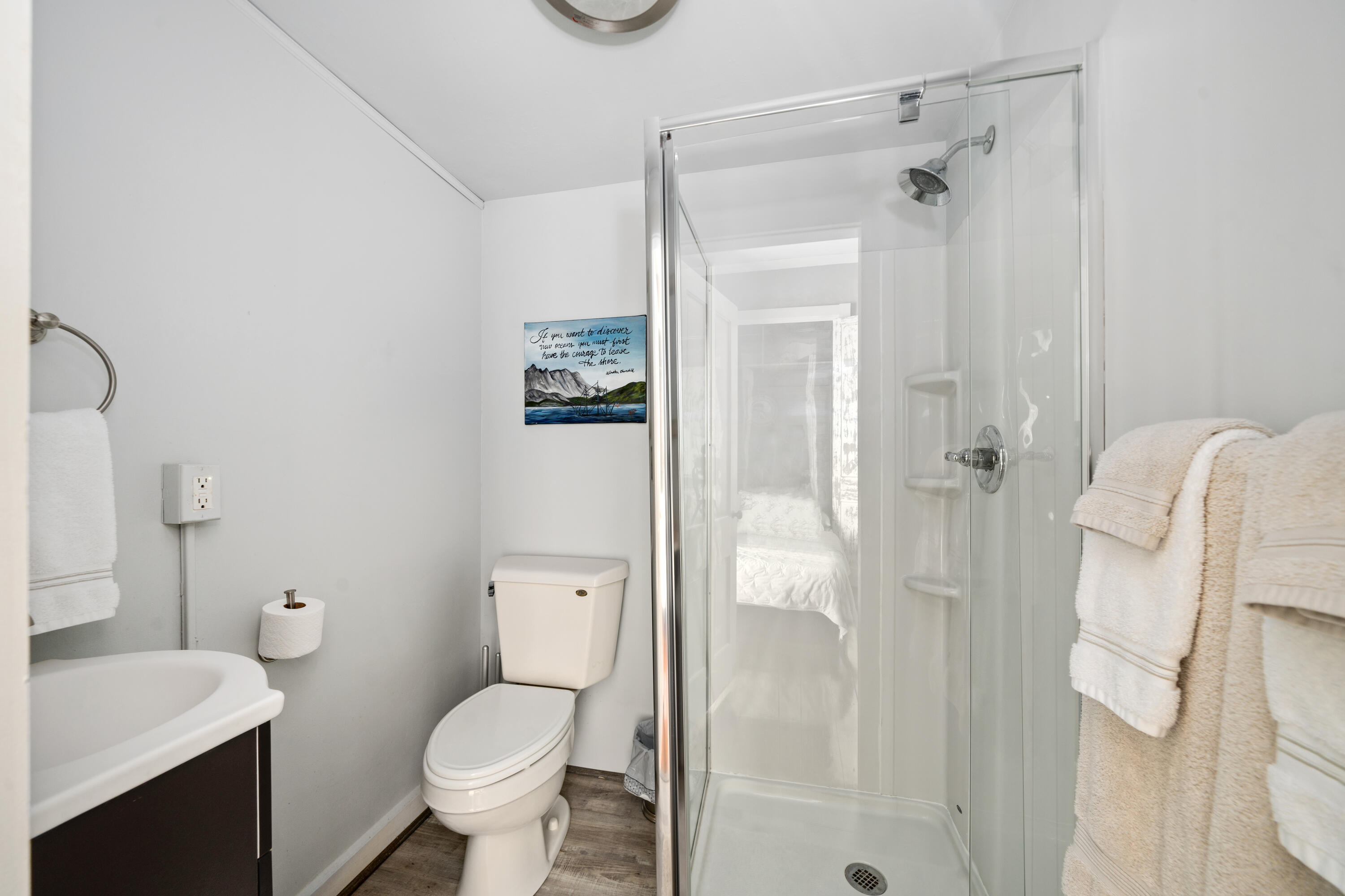 19391 Main Street Buchanan, VA 24066 - Photo 26 of 34 a bathroom with a toilet sink and shower