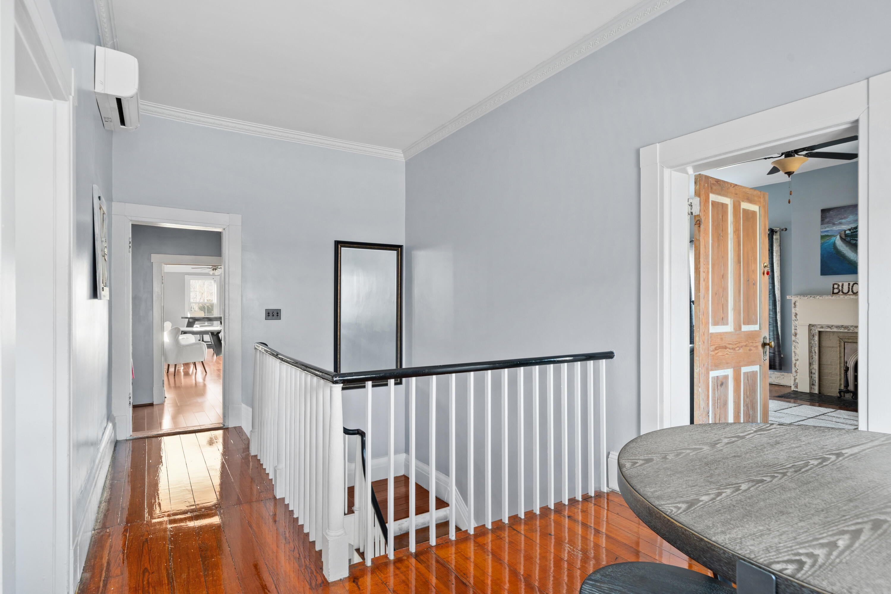 19391 Main Street Buchanan, VA 24066 - Photo 32 of 34 a view of a hallway with wooden floor and staircase