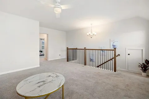 a view of a livingroom with a furniture