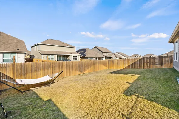 a view of a swimming pool with a lounge chairs