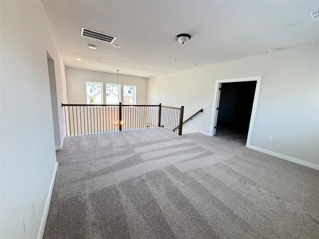 a view of a livingroom with a staircase