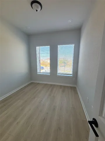 an empty room with windows