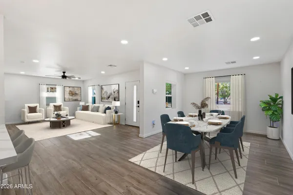 a view of a dining room with furniture