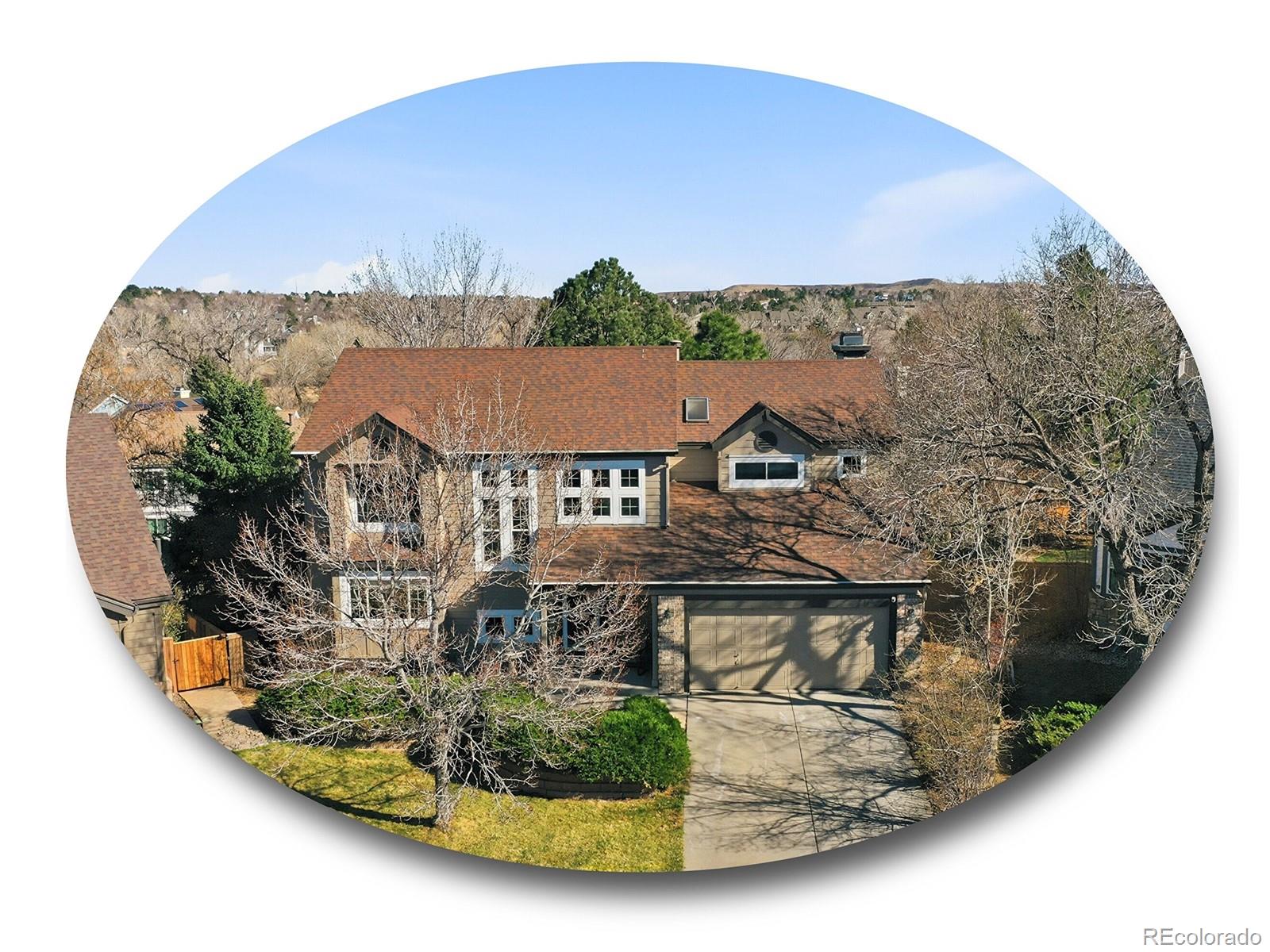 an aerial view of a house with swimming pool