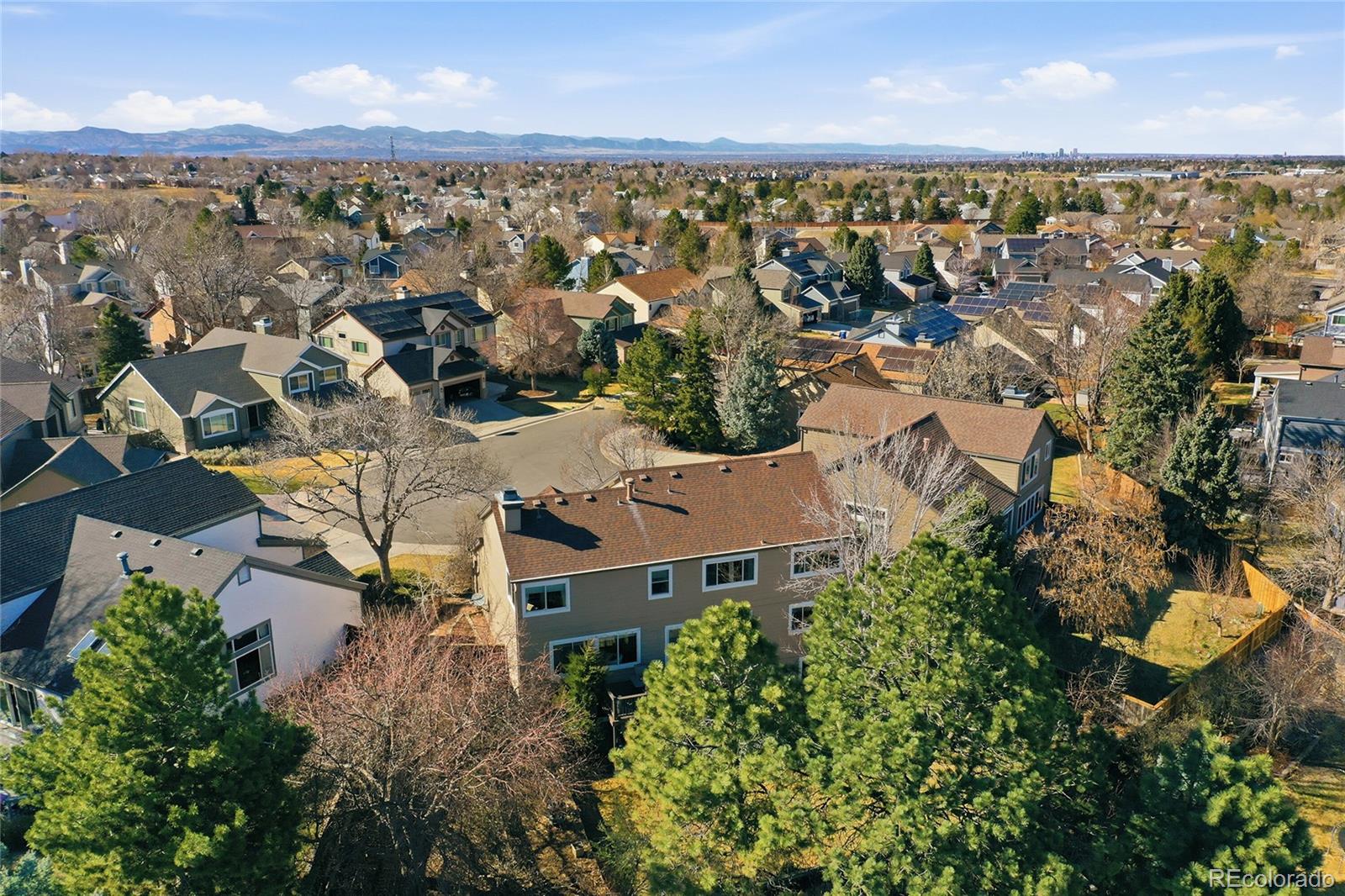 9264 Madras Court Highlands Ranch, CO 80130 - Photo 42 of 50 an aerial view of house with yard and ocean view