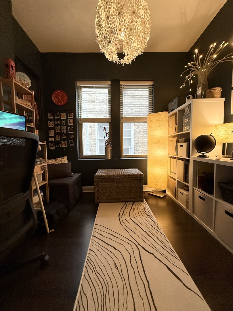 4720 North Beacon Street, Unit 2N Chicago, IL 60640 - Photo 21 of 26 a bedroom with furniture and a window
